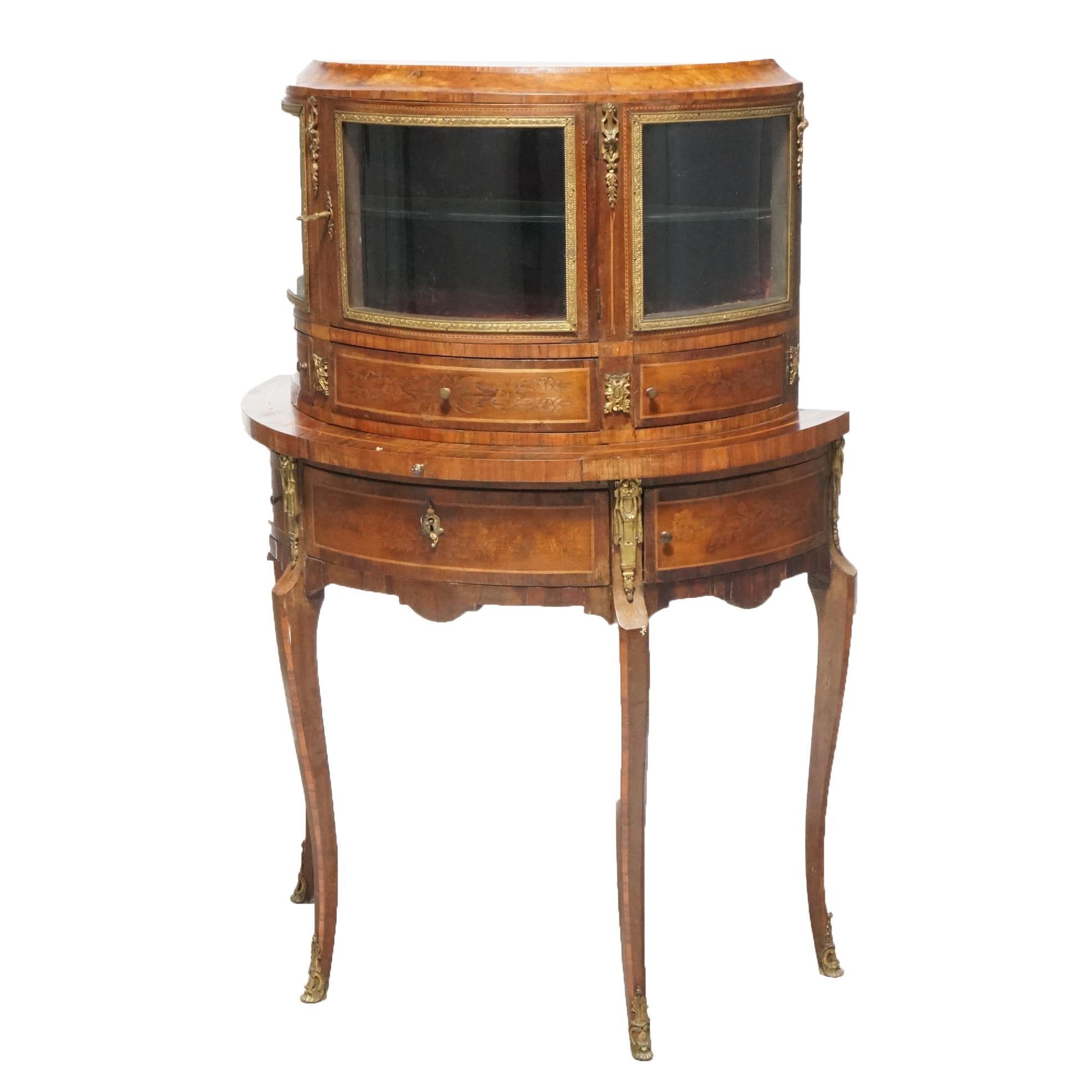 An antique French Louis XVI ladies secretary offers kingwood construction with satinwood marquetry and banded inlay in demilune form with upper display vitrine having curved glass and shelved interior over case with pull out writing tray and