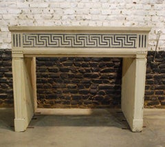 Antique French Louis XVI Limestone Fireplace with Geometric Carvings