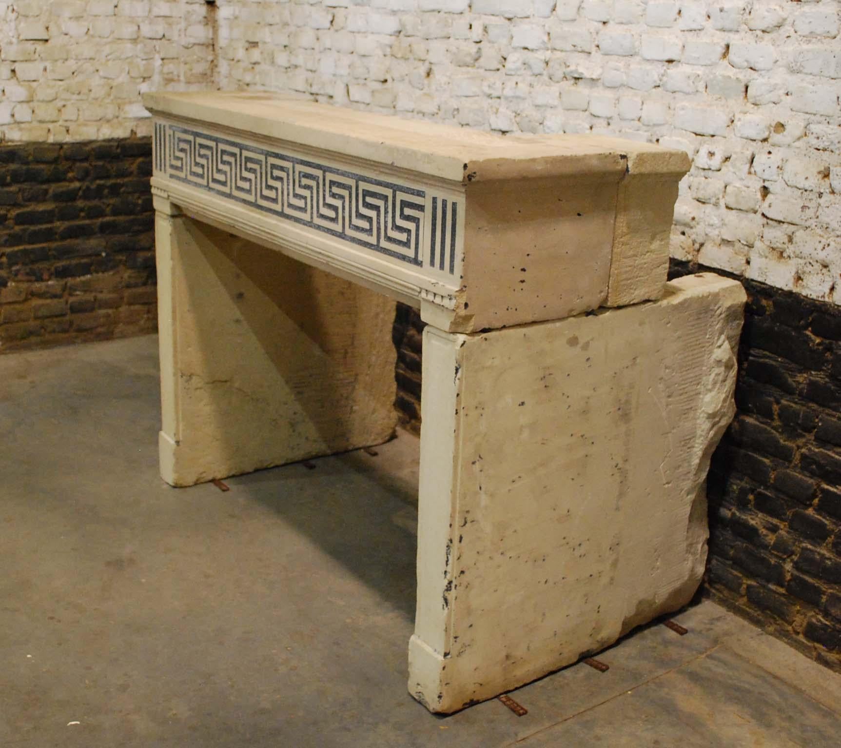 18th Century Antique French Louis XVI Limestone Fireplace with Geometric Carvings For Sale