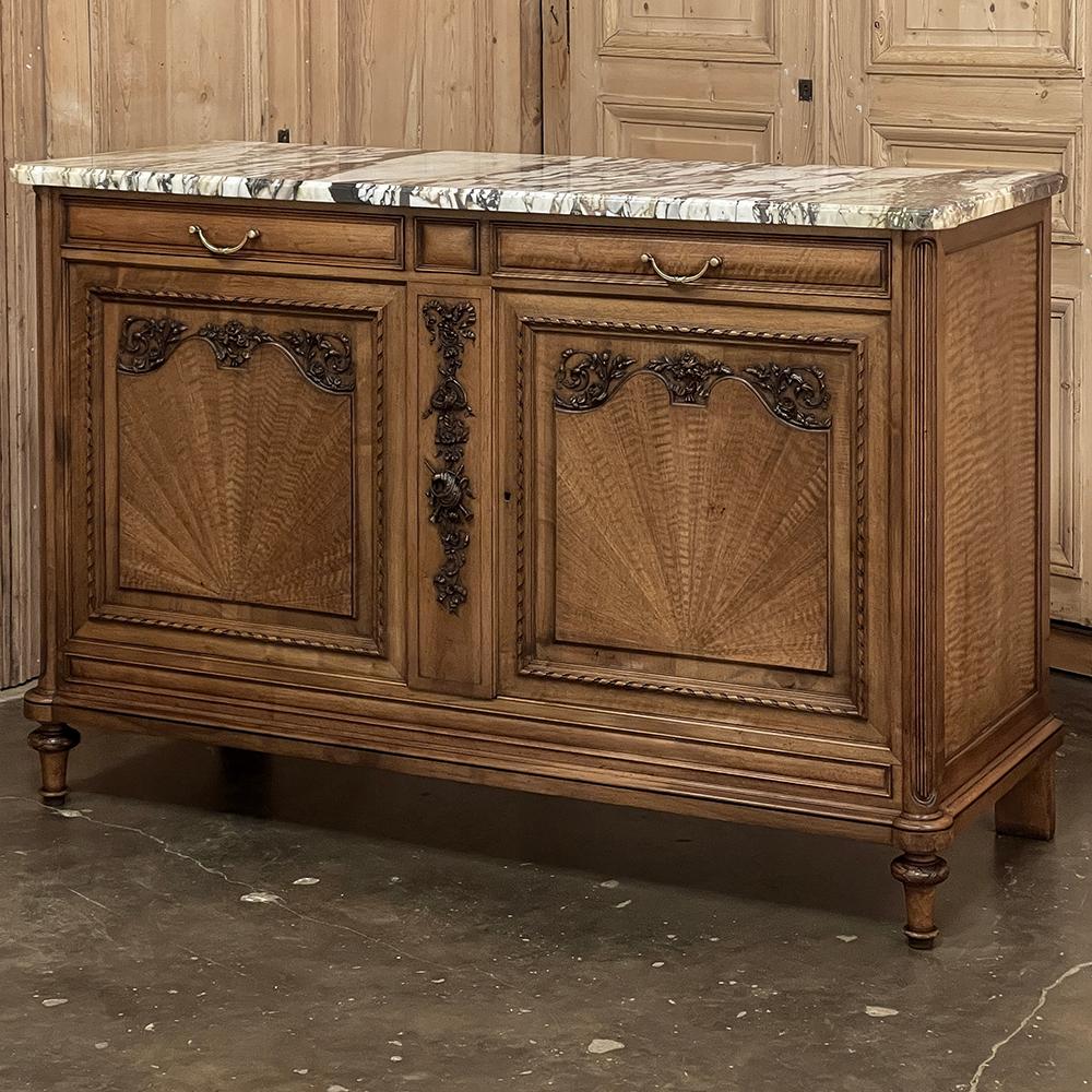 Antique French Louis XVI Maple Marquetry Marble Top Buffet is a wonderfully unusual find!  Crafted from finely figured maple with 