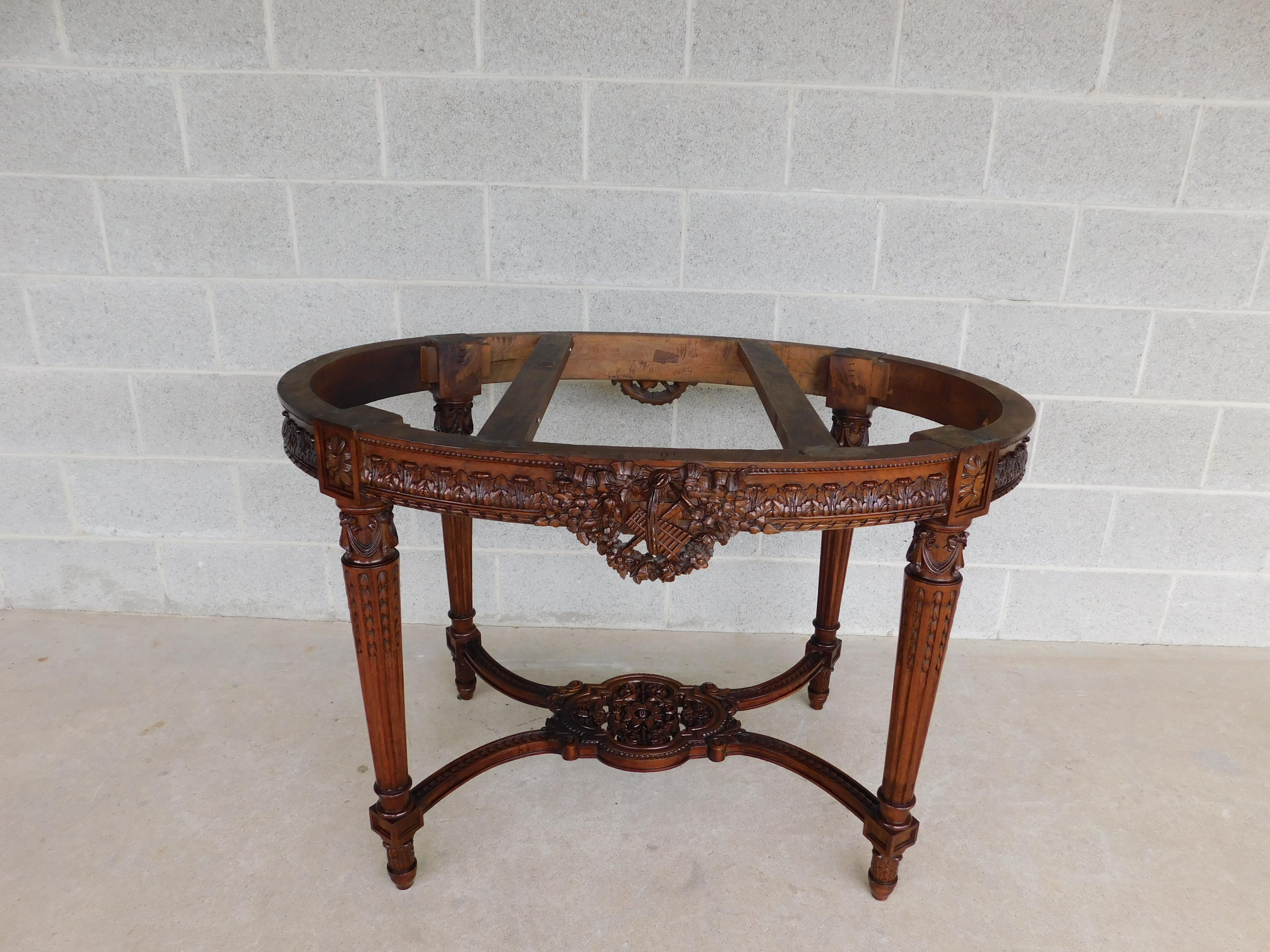 Marble Top over walnut carved and pierced frieze, tapered bell flower carved, and reeded legs. Carved undertier with blossom center. 

Excellent antique Condition,original finish, 

Measures: 30.5