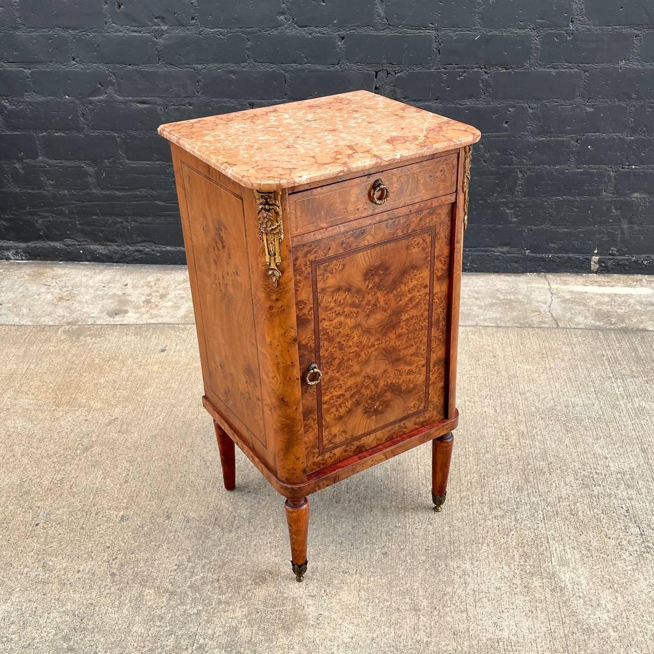 Antique French Louis XVI Night Stand with Pink Marble Top

Country: France 
Materials: Burl Wood, Original Pink Marble
Condition: Original Vintage Condition
Style: French Louis XVI
Year: 1920’s

$1,250 

Dimensions 
32”H x 17”W x 14.50”D