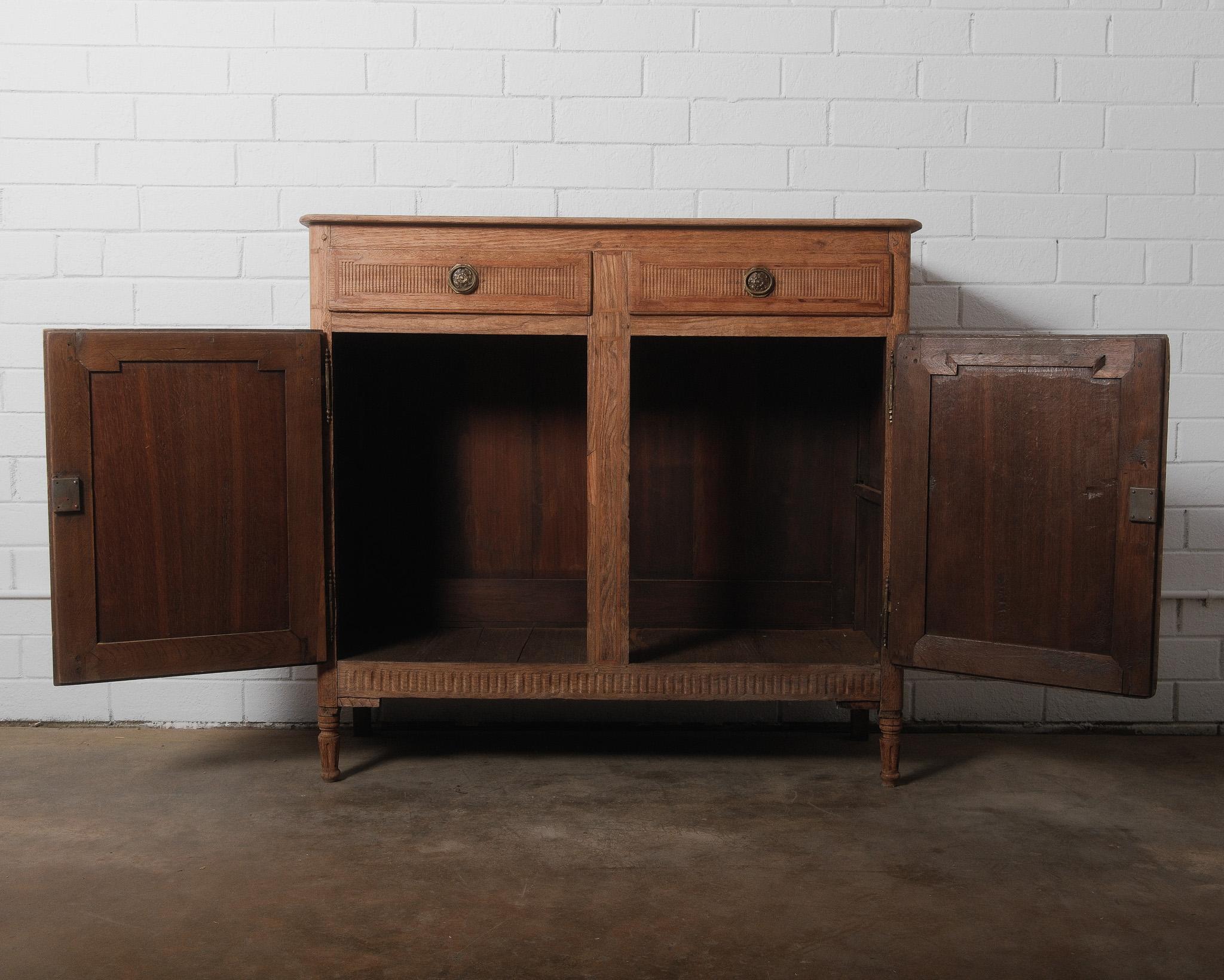 Wood Antique French Louis XVI Oak Buffet with Hand-Carved Vase Motifs, Late 18th Cen For Sale