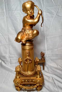 Antique French Louis XVI Andirons in Ormolu con "Putti" classici, circa 1880