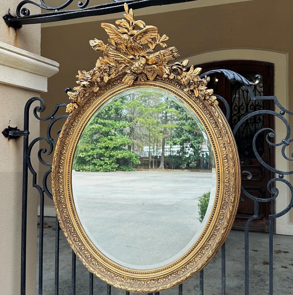 Beveled Antique French Louis XVI Oval Gilded Mirror For Sale