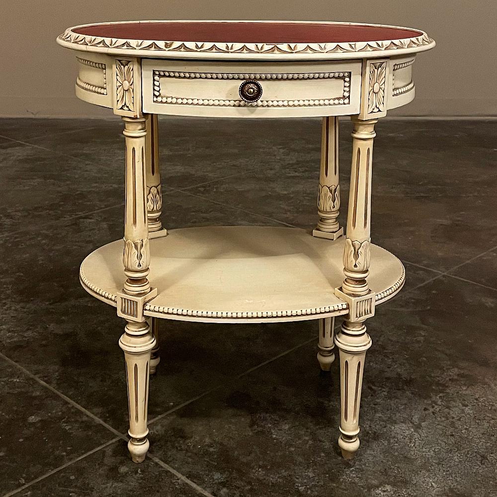 Antique French Louis XVI oval painted end table is an exquisite rendering of the style, a revival of classical architecture and decorative excellence that dates back thousands of years to the ancient Greek and Roman civilizations! Created in an oval