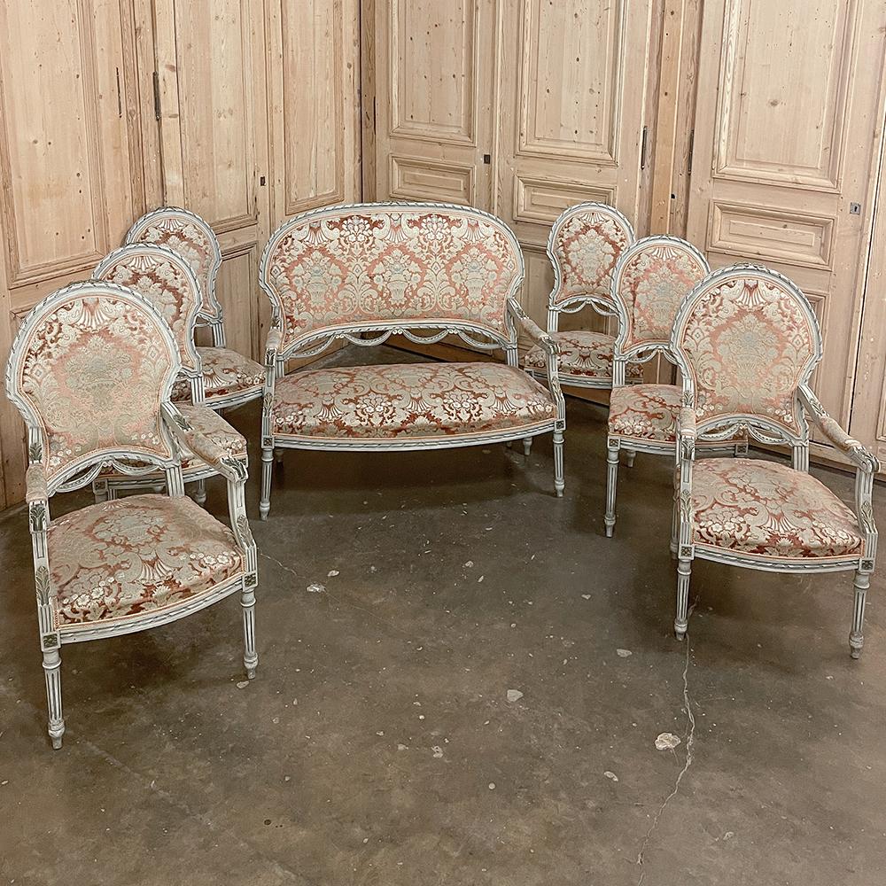 Antique French Louis XVI Painted canape ~ settee will make a classic addition to any decor! The oval seat back and generous seat are framed in incredibly detailed carved fruitwood, styled with spiral ribbon, fabric swags and acanthus leaves, all