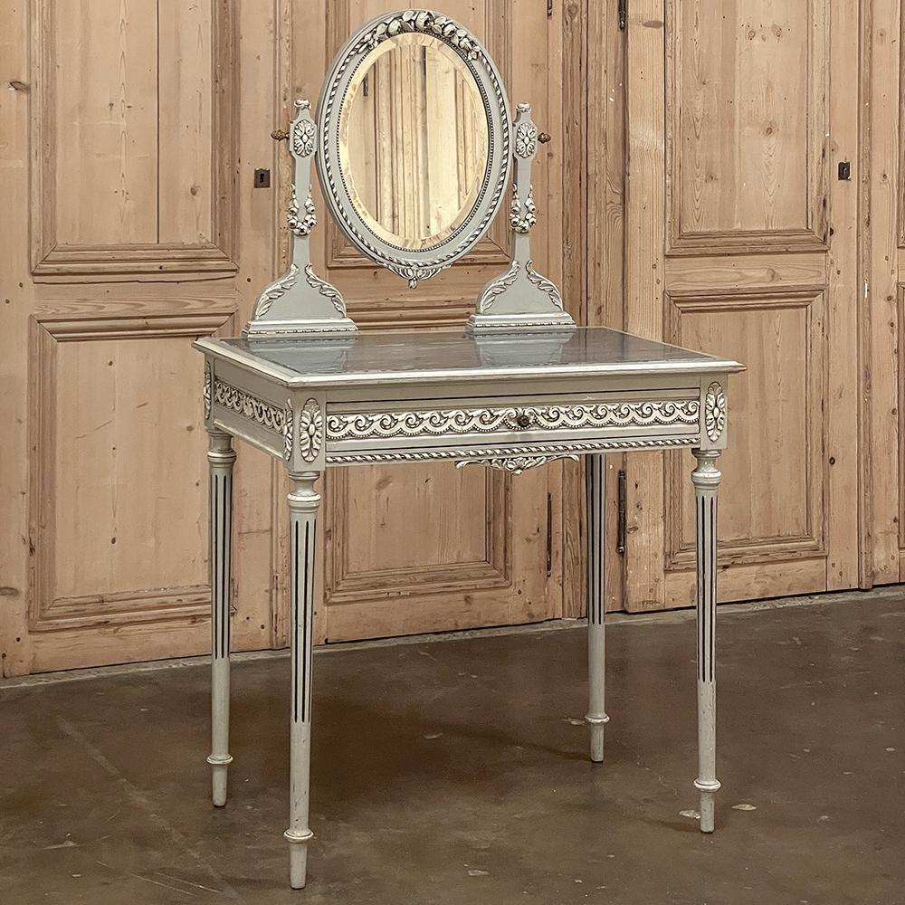 Antique French Louis XVI Painted Marble Top Vanity will make the perfect finishing touch to your room! Crafted in the neoclassic style from top to bottom, it features a variety of hand-carved embellishments and an original painted finish that has