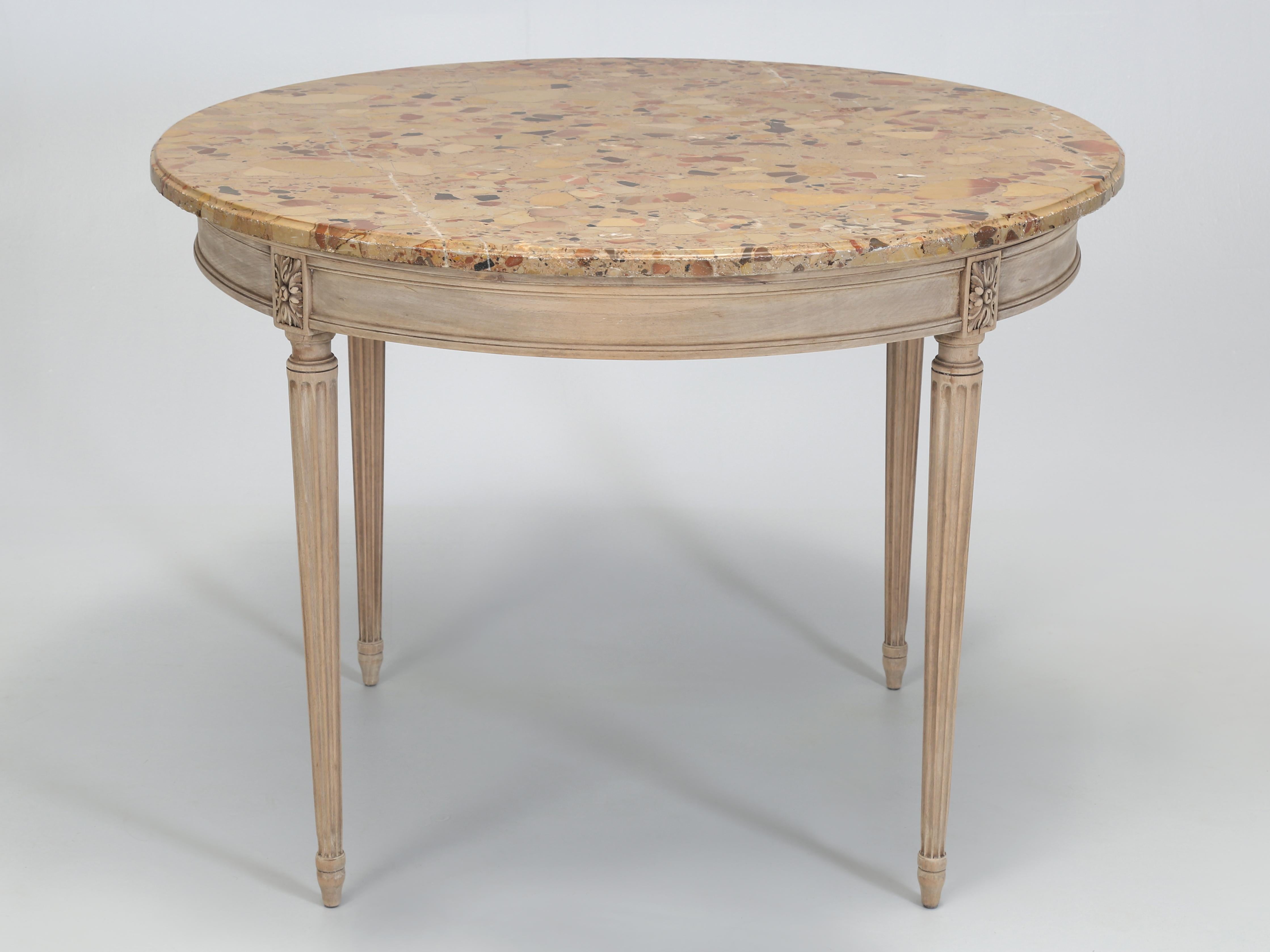 Antique French Louis XVI Kitchen Table or Small Dining Room Table that was purchased new at Gallot Frères (brothers) Shop located at 54 Avenue de Suffren in Paris. Our Antique Marble Top Louis XVI Round Table was found in the small Village of