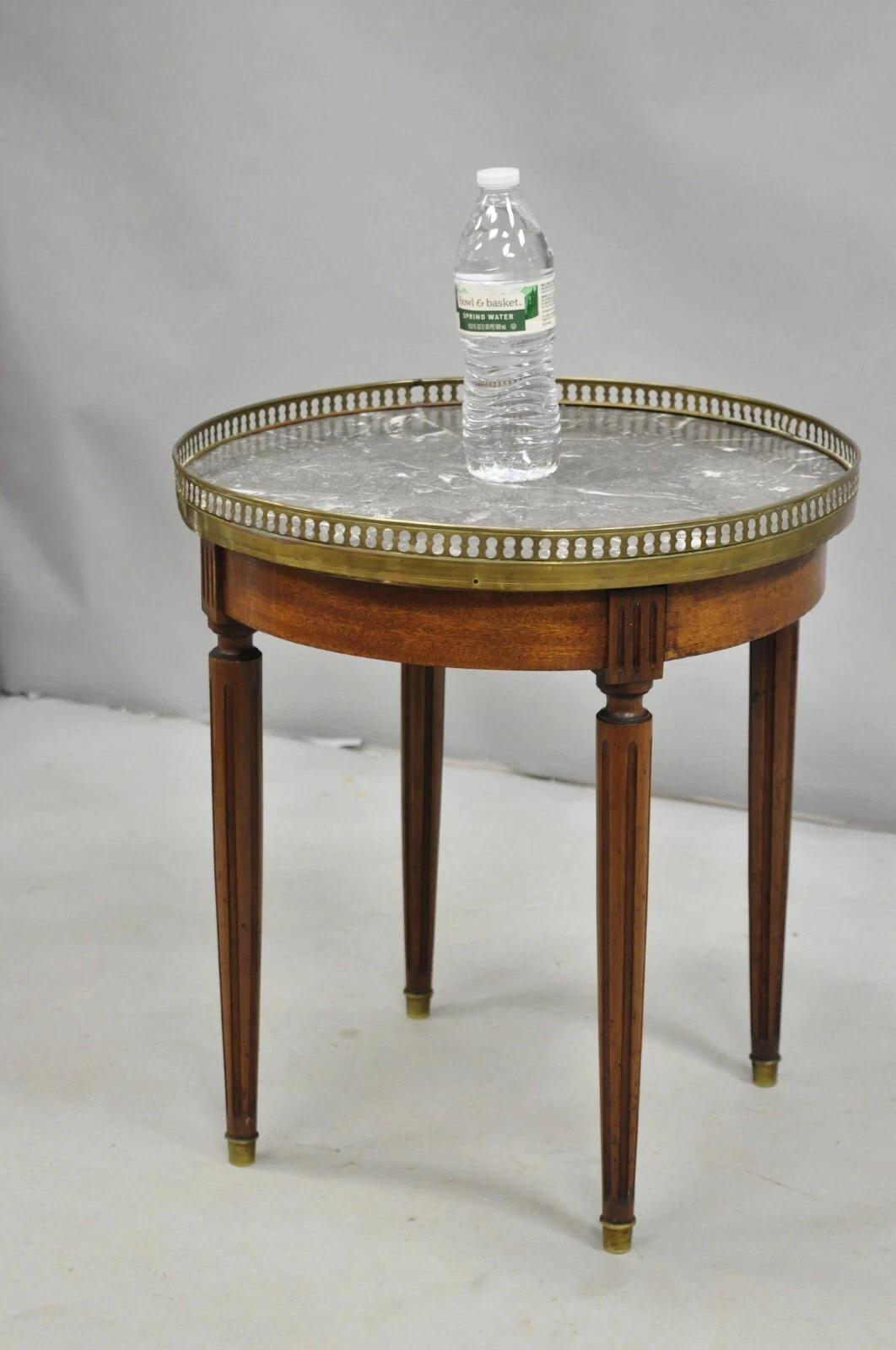 Antique French Louis XVI Style Round Marble Top Small Bouillotte Drinks Side Table with Brass Gallery and Brass Foot Caps. Circa Early 20th Century. Measurements: 20