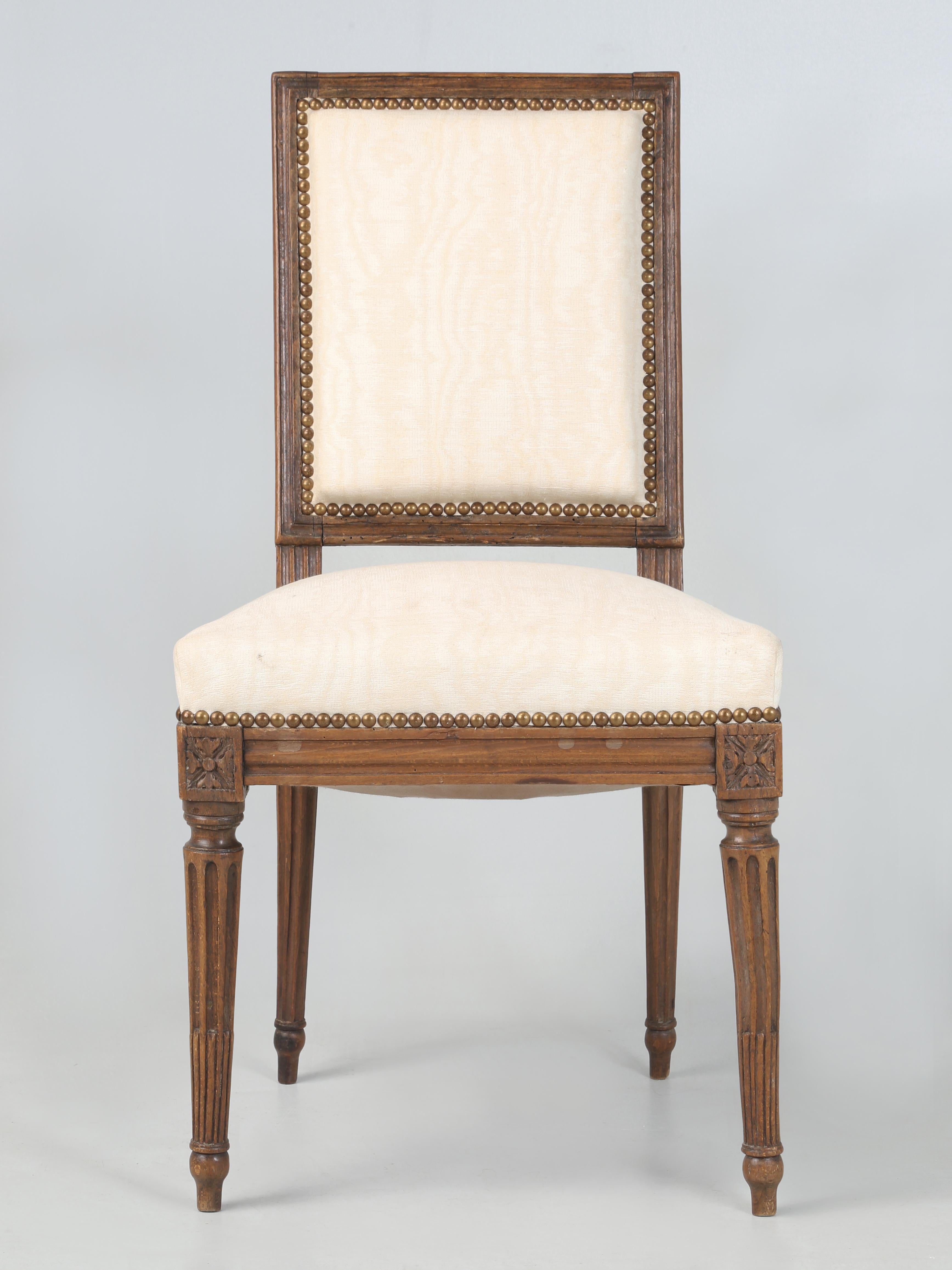 Antique French Louis XVI Side Chair in Hand-Carved Walnut Over 200-Years Old. In the 35-years we have been importing from France, this might be the oldest original Louis XVI Chair we have ever imported and it was not until we did a thorough