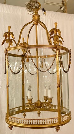 Antique French Louis XVI Style Bronze D'Oré & Curved Glass Lantern, Circa 1890.