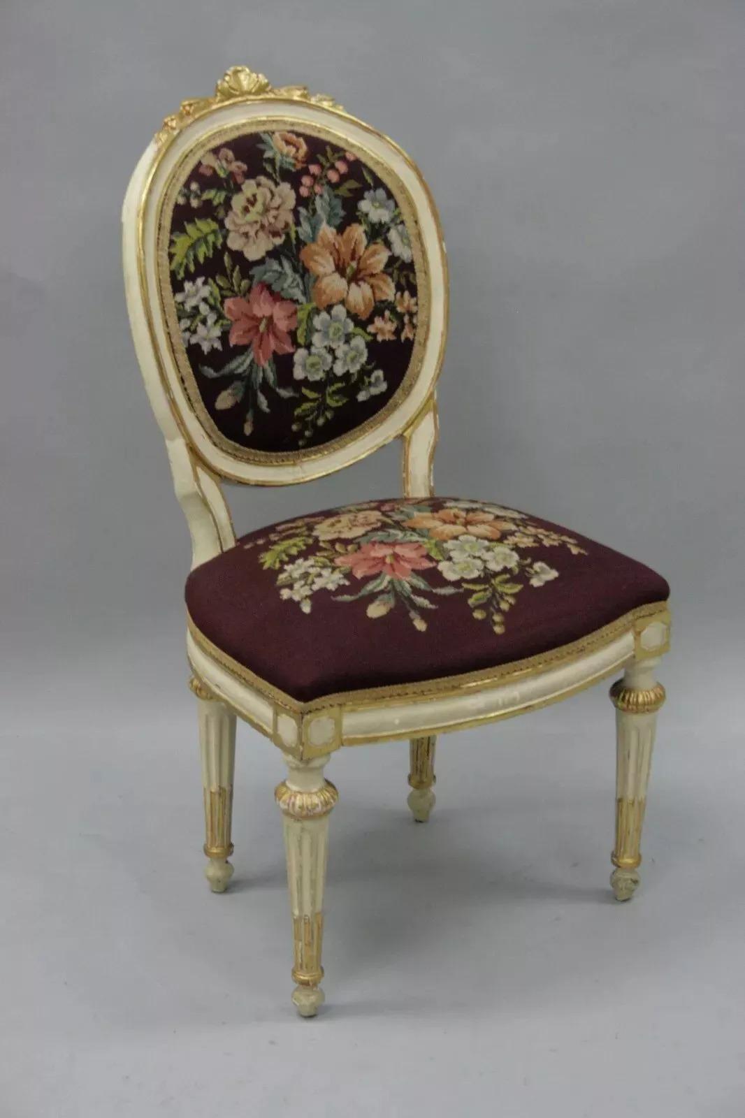 Antique French Louis XVI Style Carved Floral Needlepoint Accent Chair White Gold. Item features floral carving, Oval back, Fluted column form legs, Floral needlepoint seat and back, Burgundy upholstery, White and gold painted frame. Circa Mid 20th