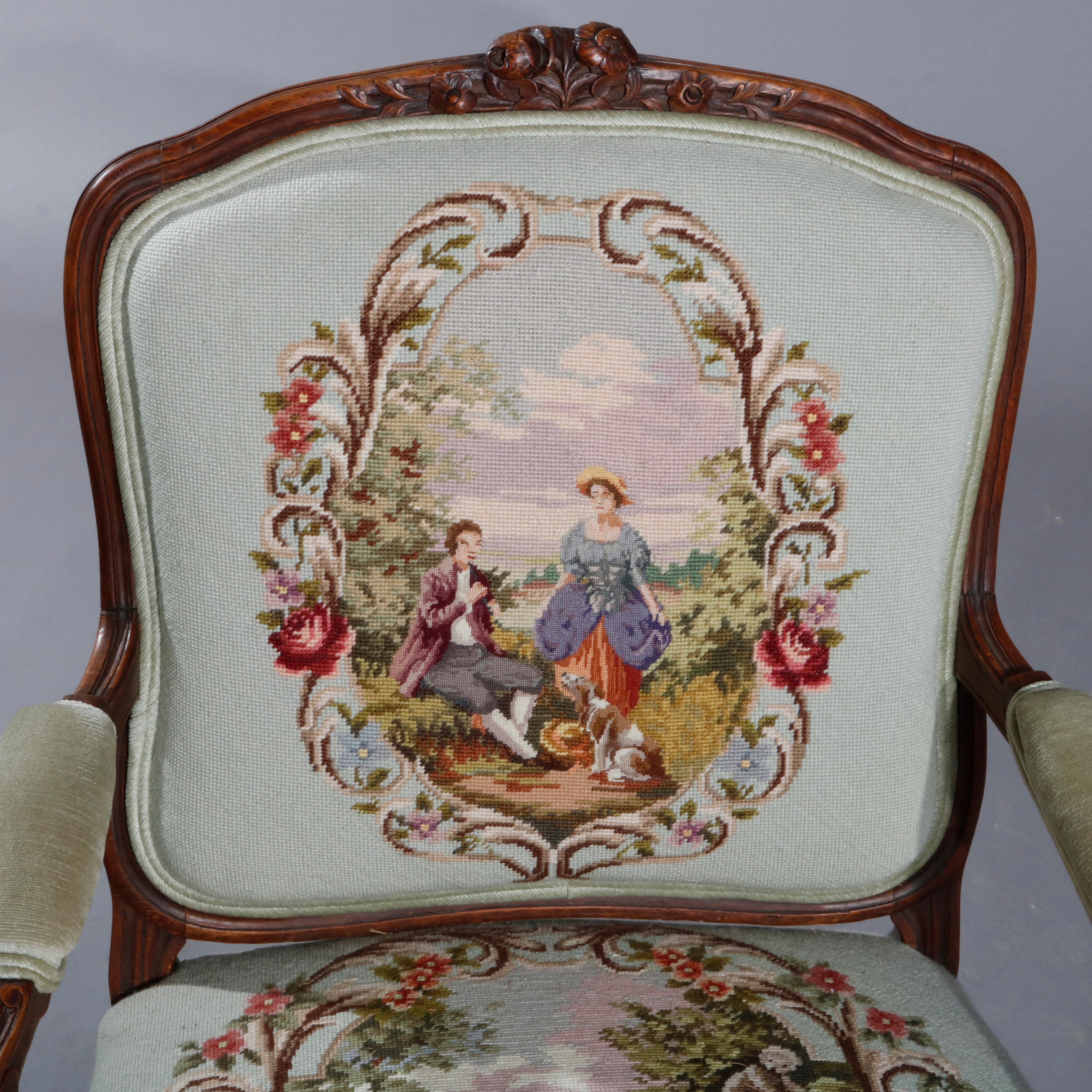 An antique French Louis XVI armchair offers carved fruitwood frame raised on cabriole legs terminating in scroll form feet with needlepoint tapestry back and seat courting and landscape scenes, circa 1920

Measures: 39
