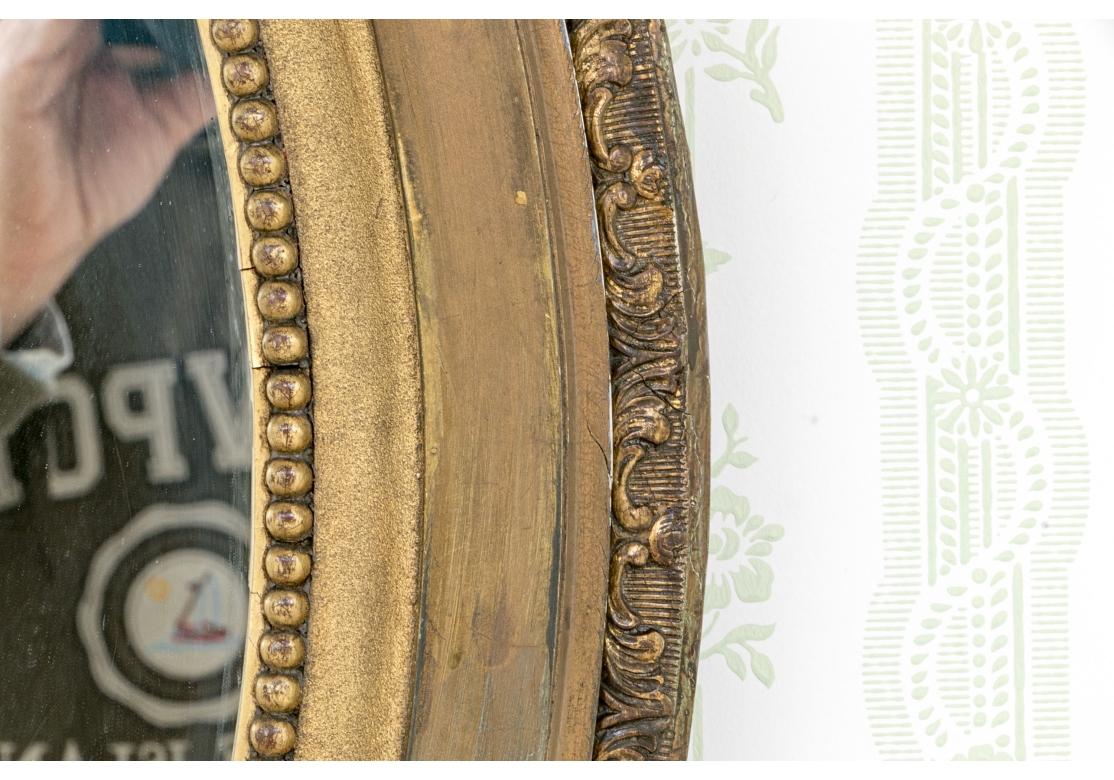 Antique French Louis XVI Style Carved Oval Gesso & Giltwood Mirror For Sale 1