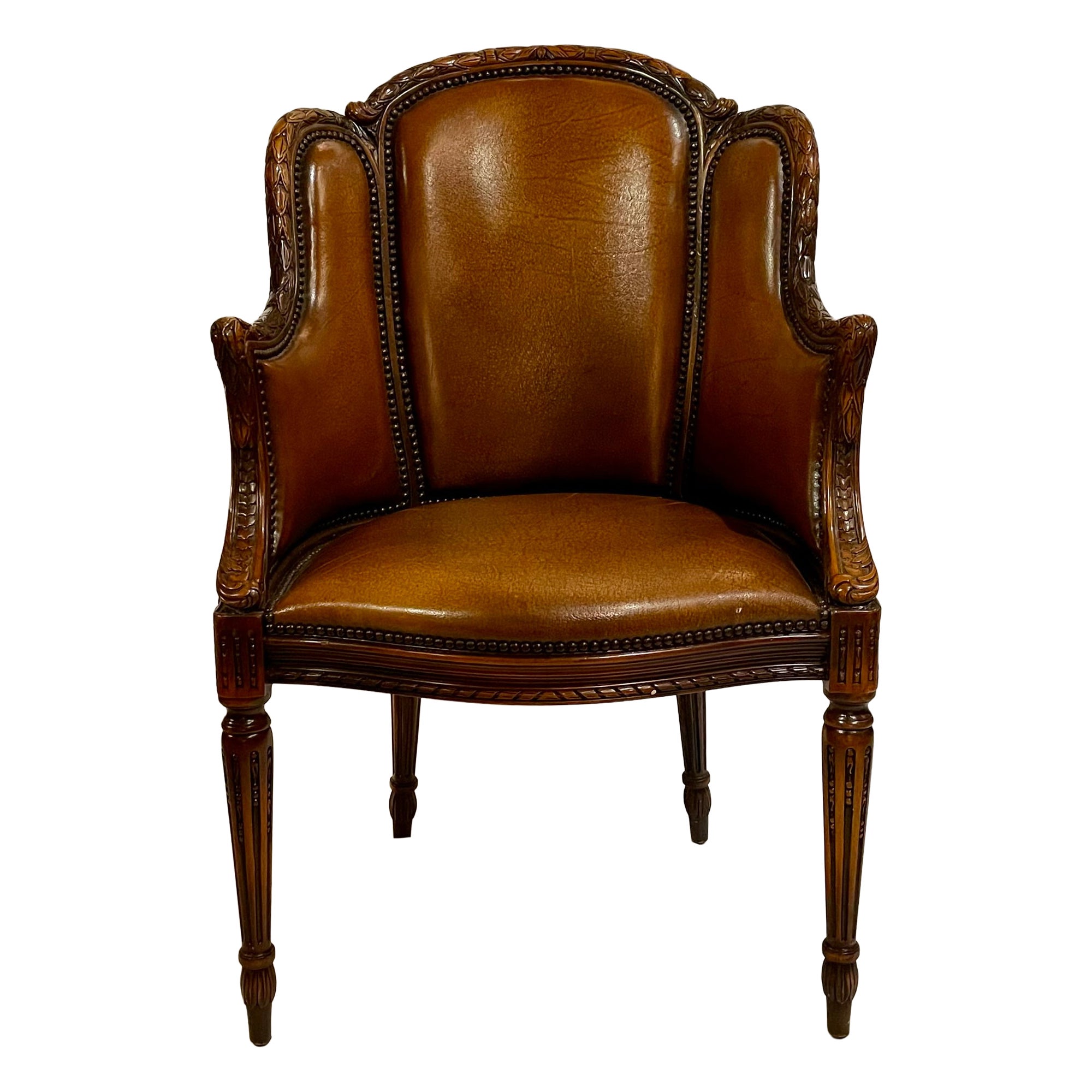 Antique French Louis XVI Style Carved Walnut and Leather Armchair, Circa 1890
s. en vente