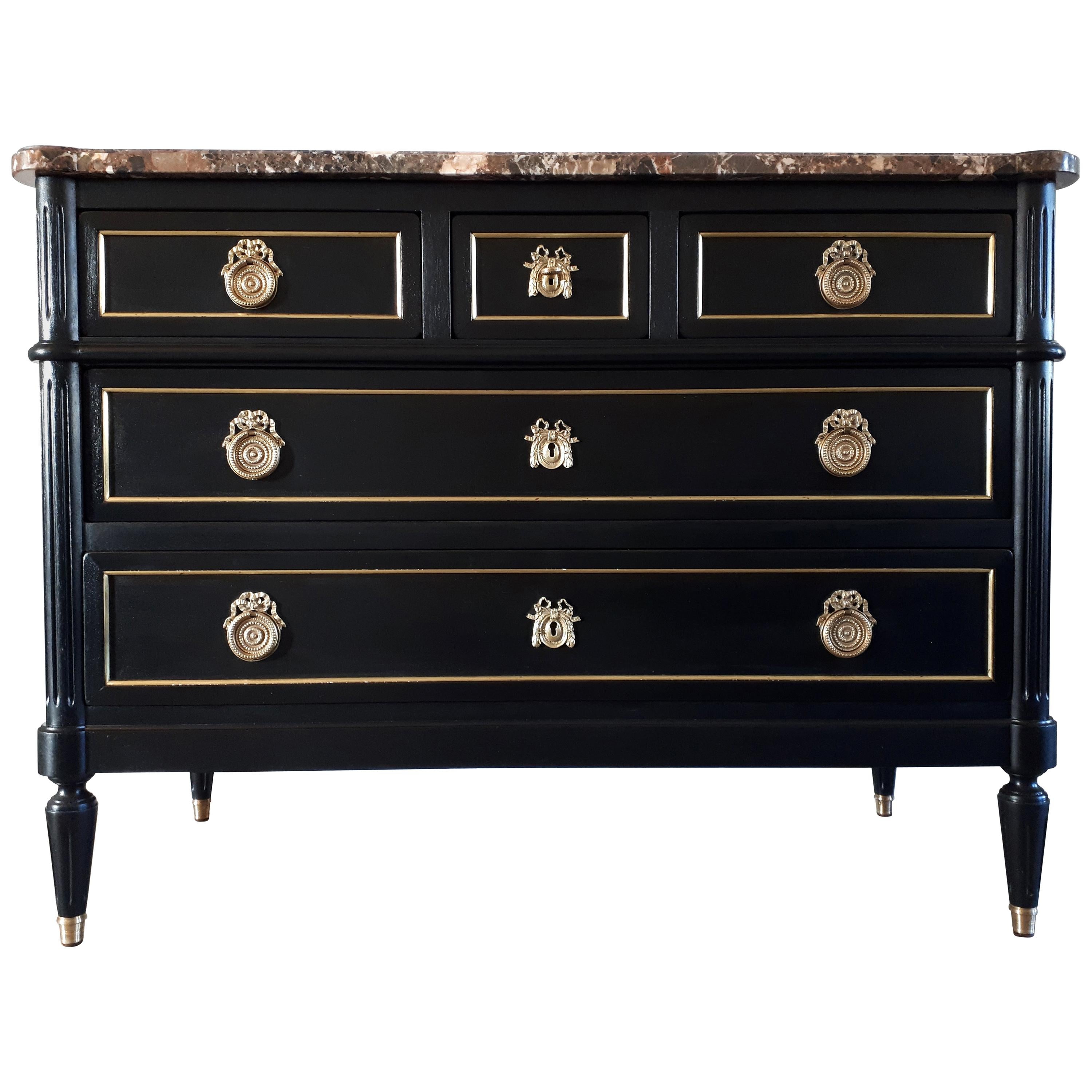 Antique French Louis XVI style chest of drawers topped with a rare and wonderful brown, grey, white and some copper touch marble, named Brèche Nouvelle and from France. Legs are fluted and finished with golden bronze clogs. Five dovetailed drawers