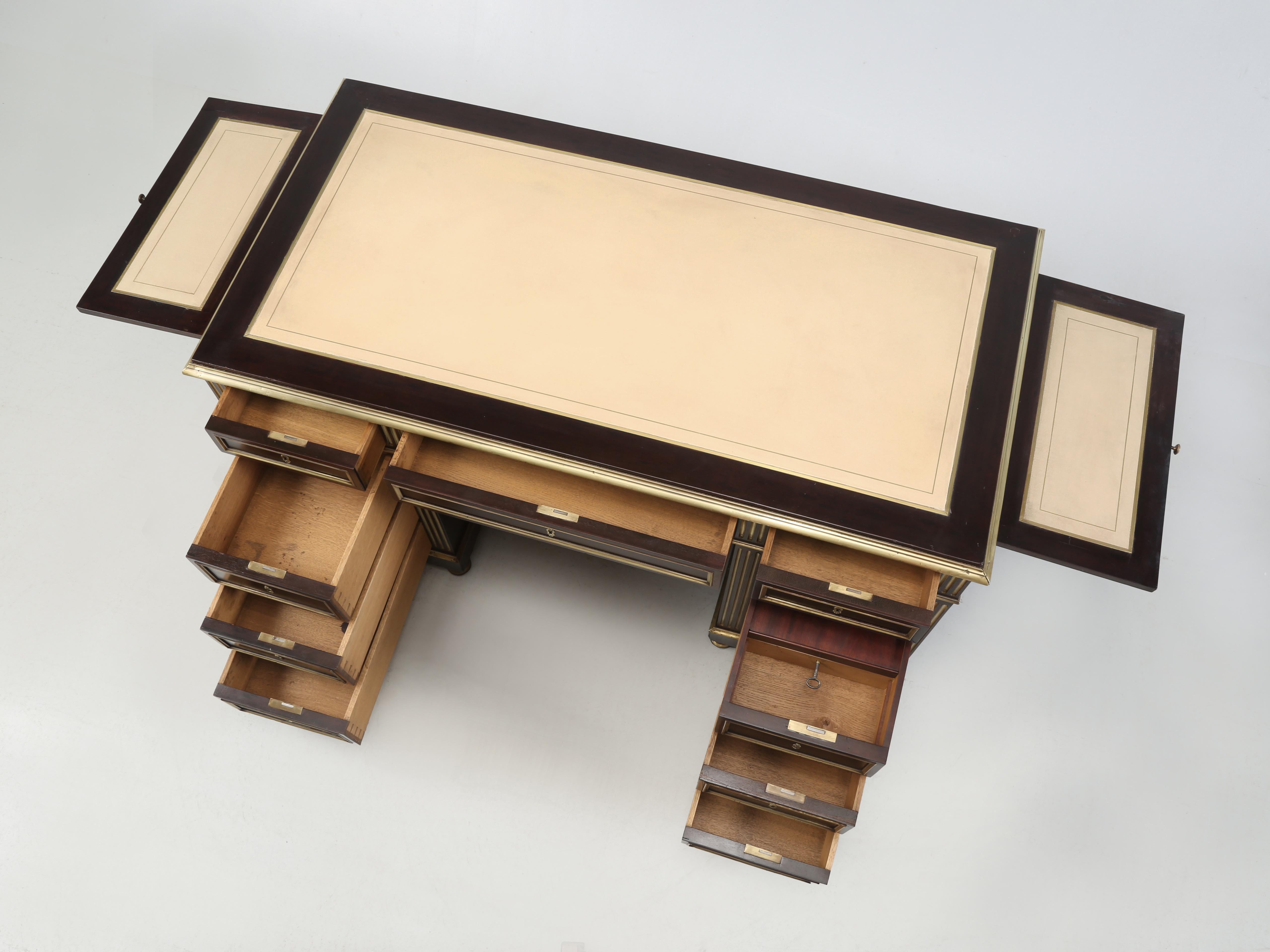 Antique French Mahogany Louis XVI Style Desk that has just emerged from a multi-month thorough restoration. Yes, we got carried away by the unique crazy build quality that we kept discovering while we disassembled this Louis XVI desk. In our 30-plus
