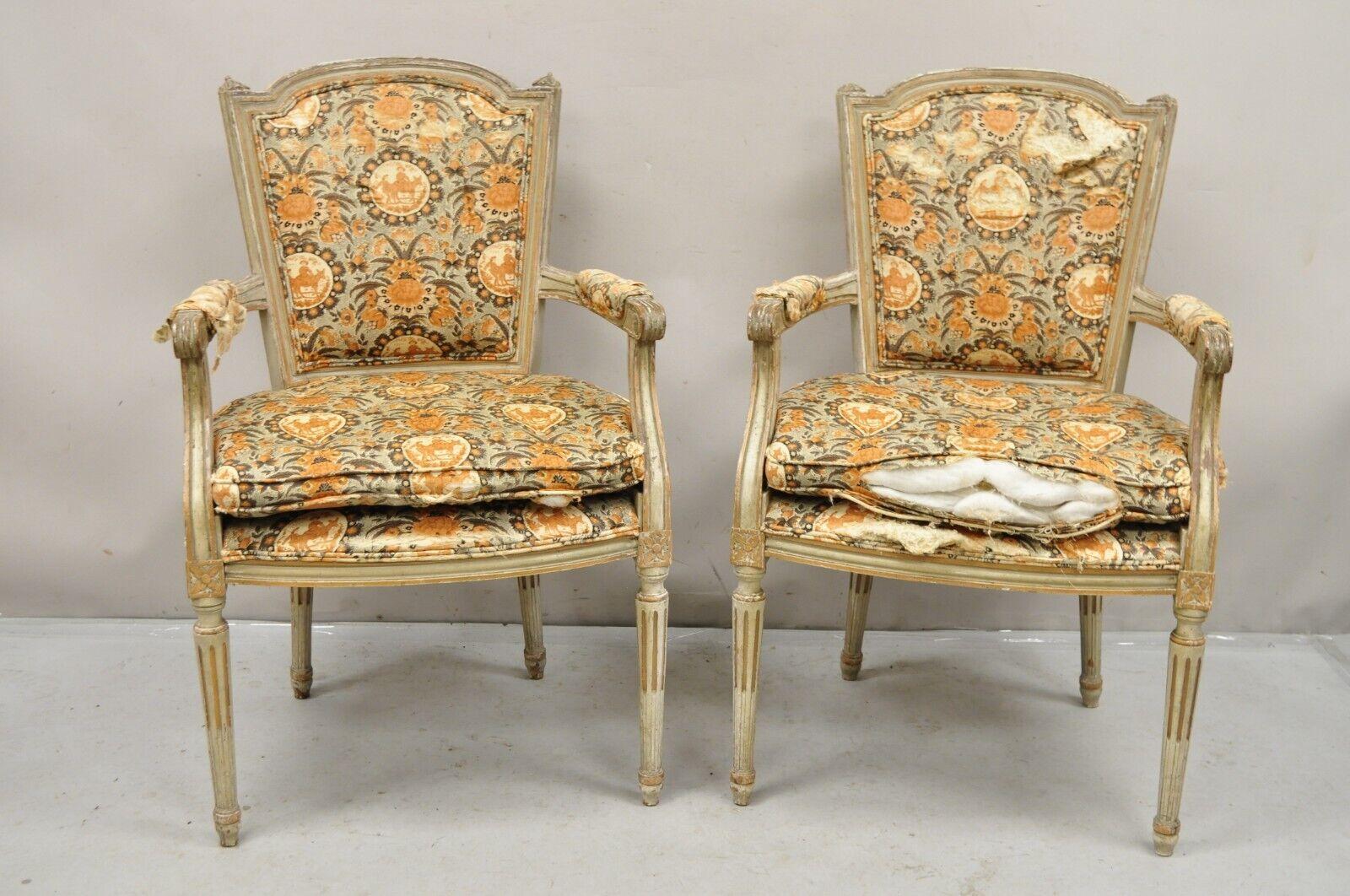 Antique French Louis XVI Style Distressed Cream Painted Fauteuil Arm Chairs - a Pair. Circa Early 1900s. Measurements: 38.5
