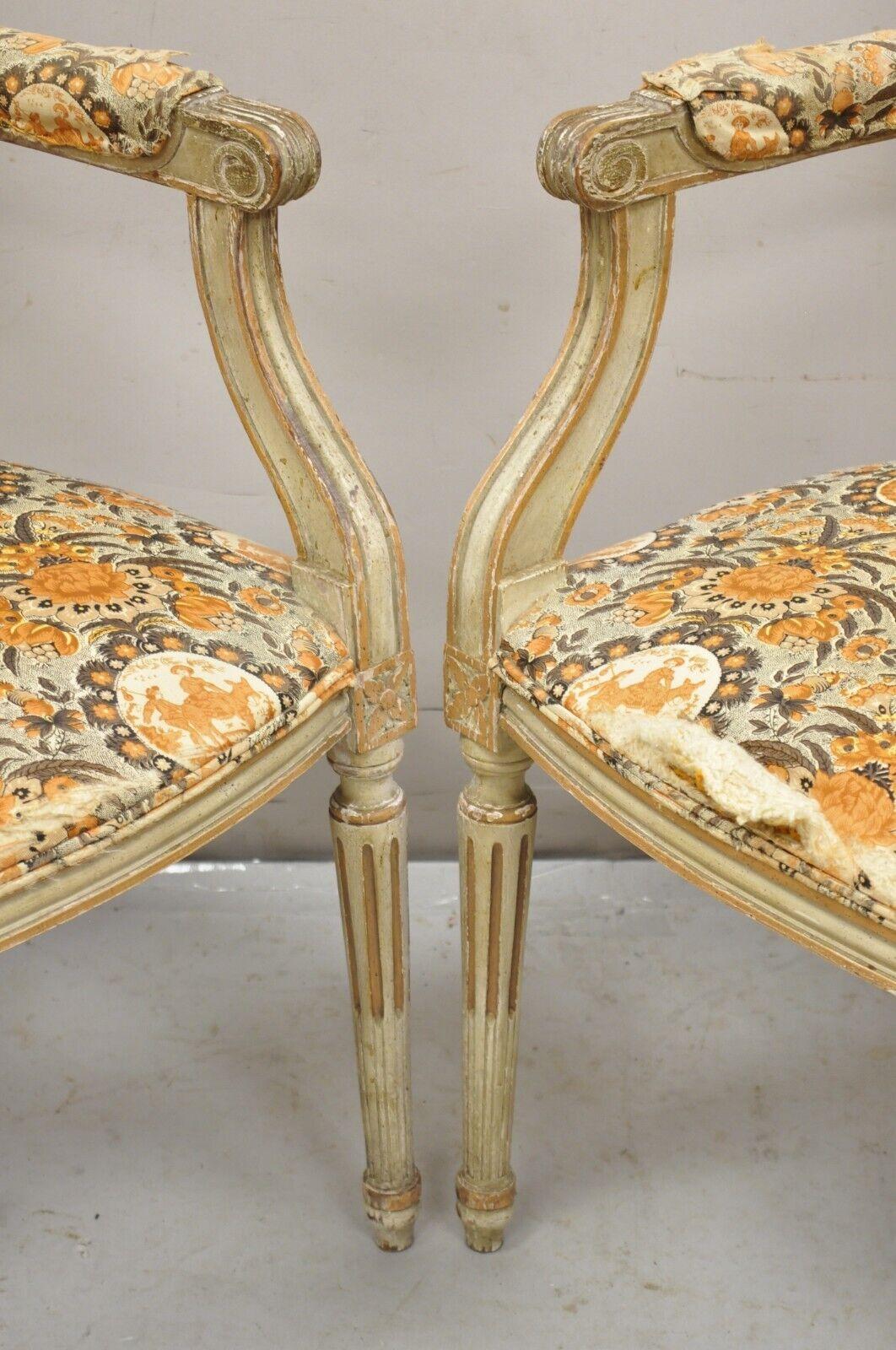 Early 20th Century Antique French Louis XVI Style Distressed Cream Painted Fauteuil Arm Chairs Pair For Sale
