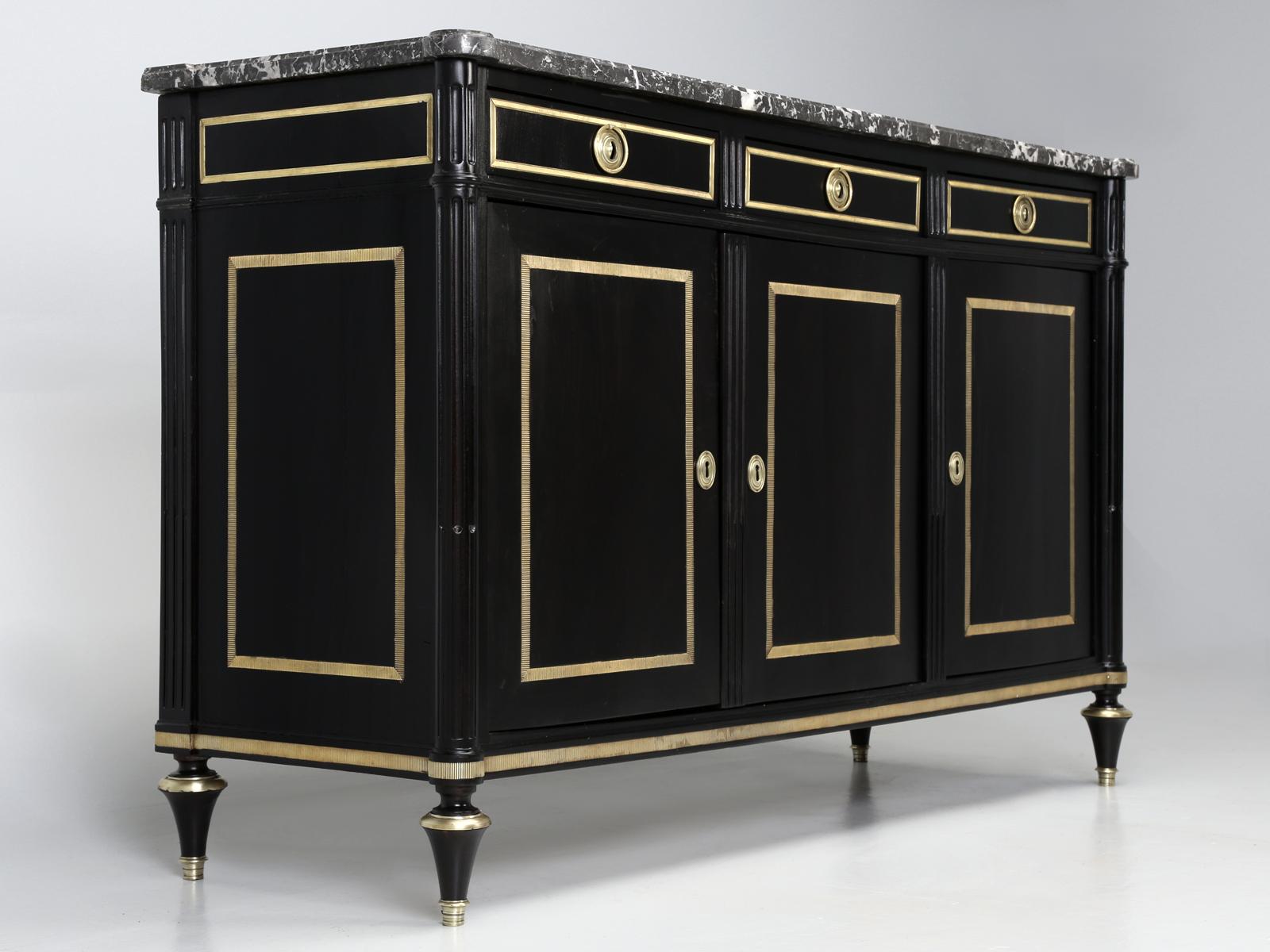 French buffet or enfilade, in the style of Louis XVI and completely restored in our workshop. This beautiful, French Louis XVI style buffet was found in the town of Pamiers, France, a small town of around 15,000 people, just south of Toulouse. We