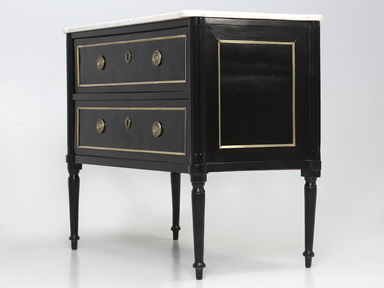 Early 20th Century Antique French Louis XVI Style Ebonized Commode with a Marble Top