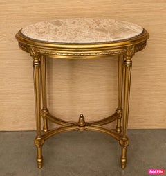 Antique French Louis XVI Style Tavolo consolle ovale dorato con quattro gambe