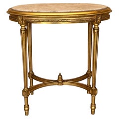 Antique French Louis XVI Style Tavolo consolle ovale dorato con quattro gambe