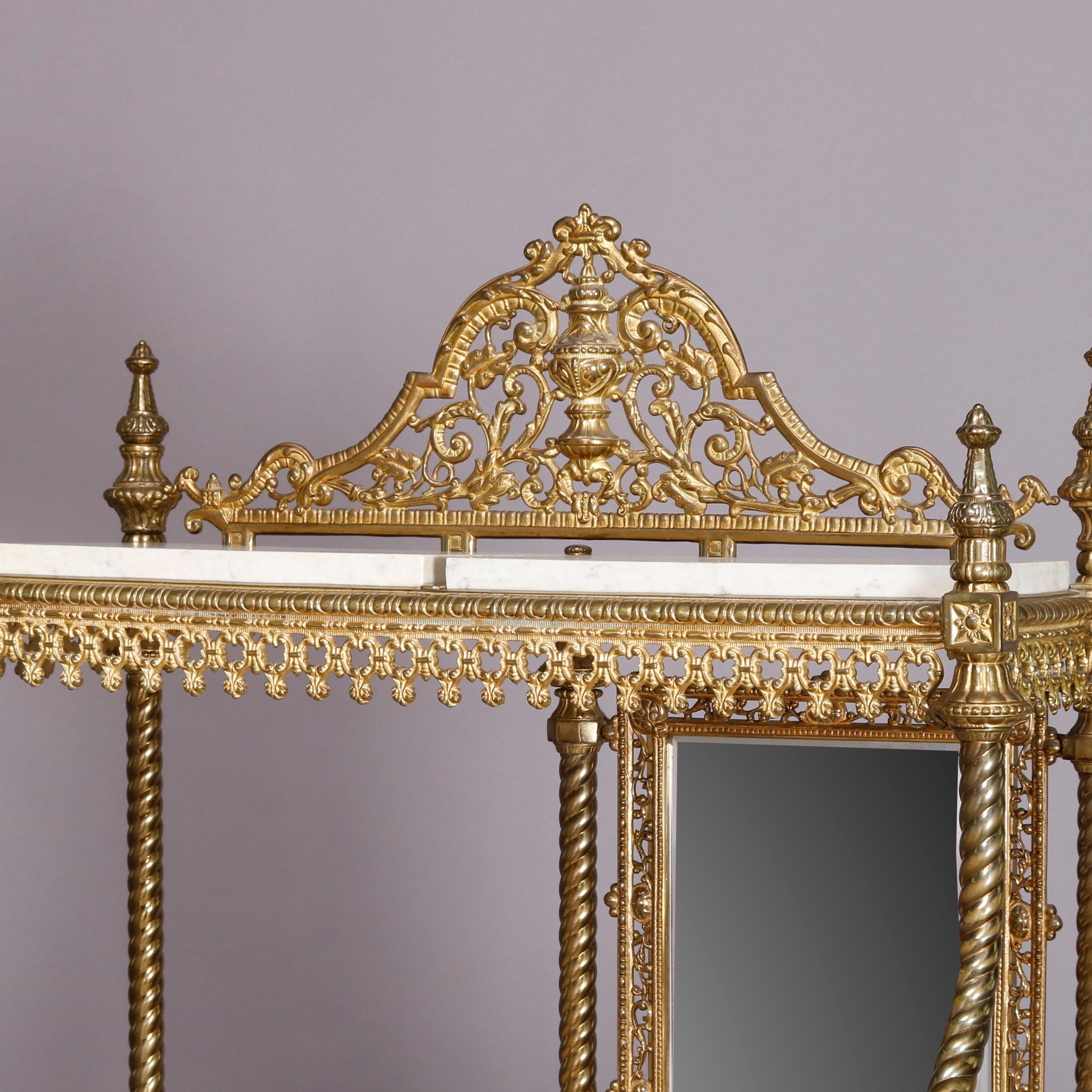 An antique French Louis XVI style étagère offers gilt bronze pierced foliate and floral frame with shaped crest having central urn surmounting staggered marble top shelves, central offset mirror and twisted posts terminating in paw feet, circa