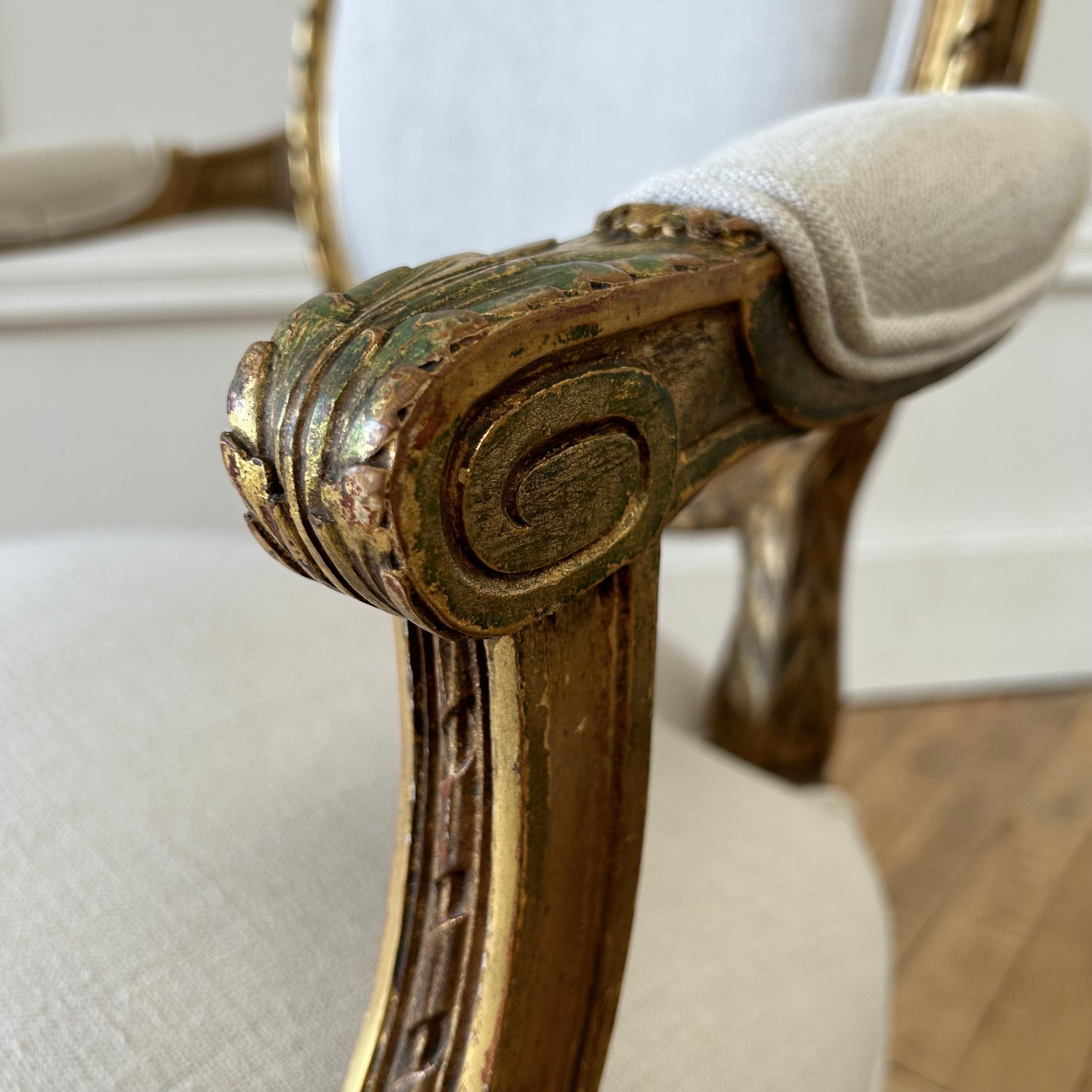 Antique French Louis XVI Style Gilt Wood Upholstered Linen Arm Chairs For Sale 6