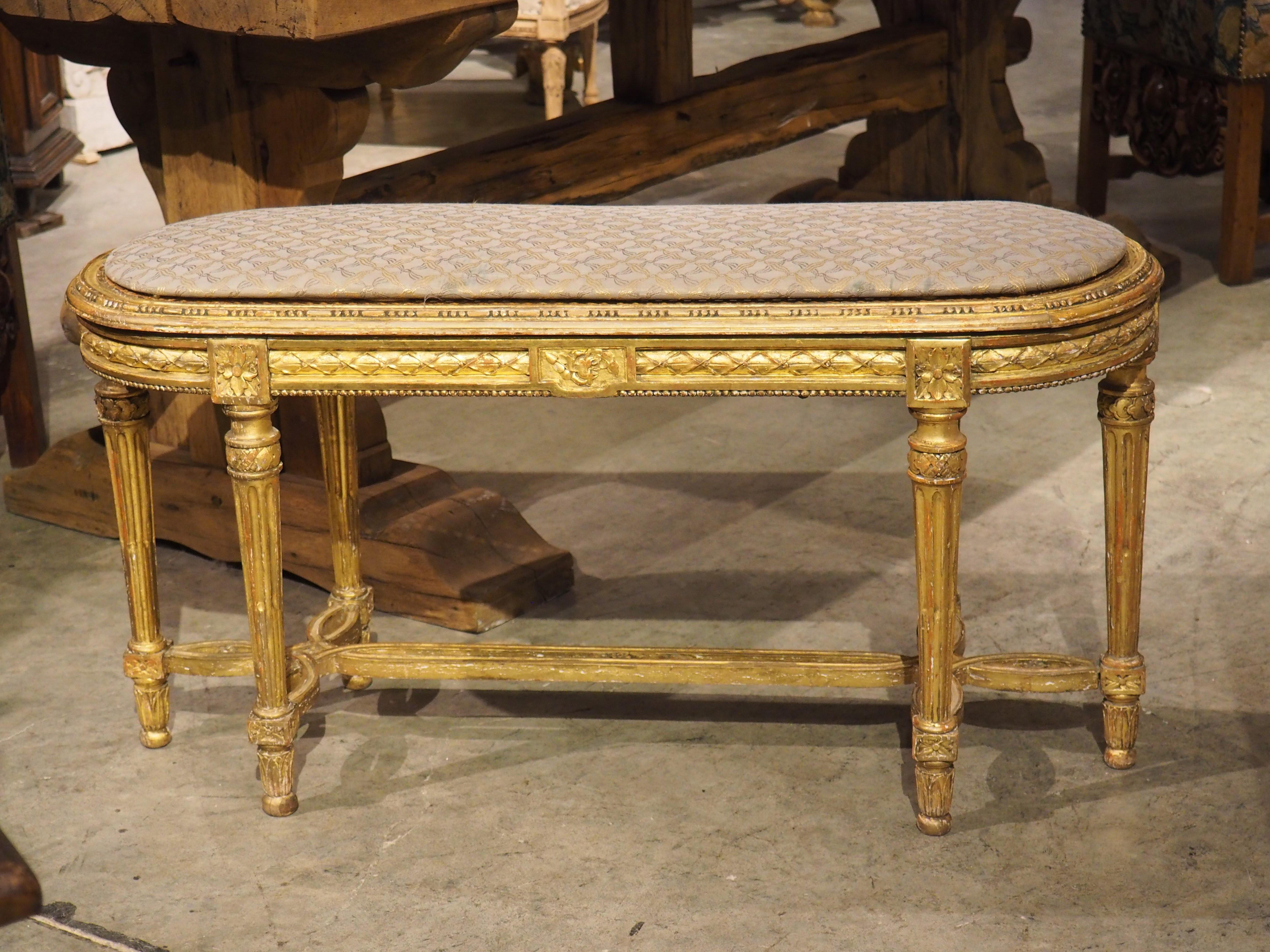 Hand-Carved Antique French Louis XVI Style Giltwood Caned Bench, C. 1885