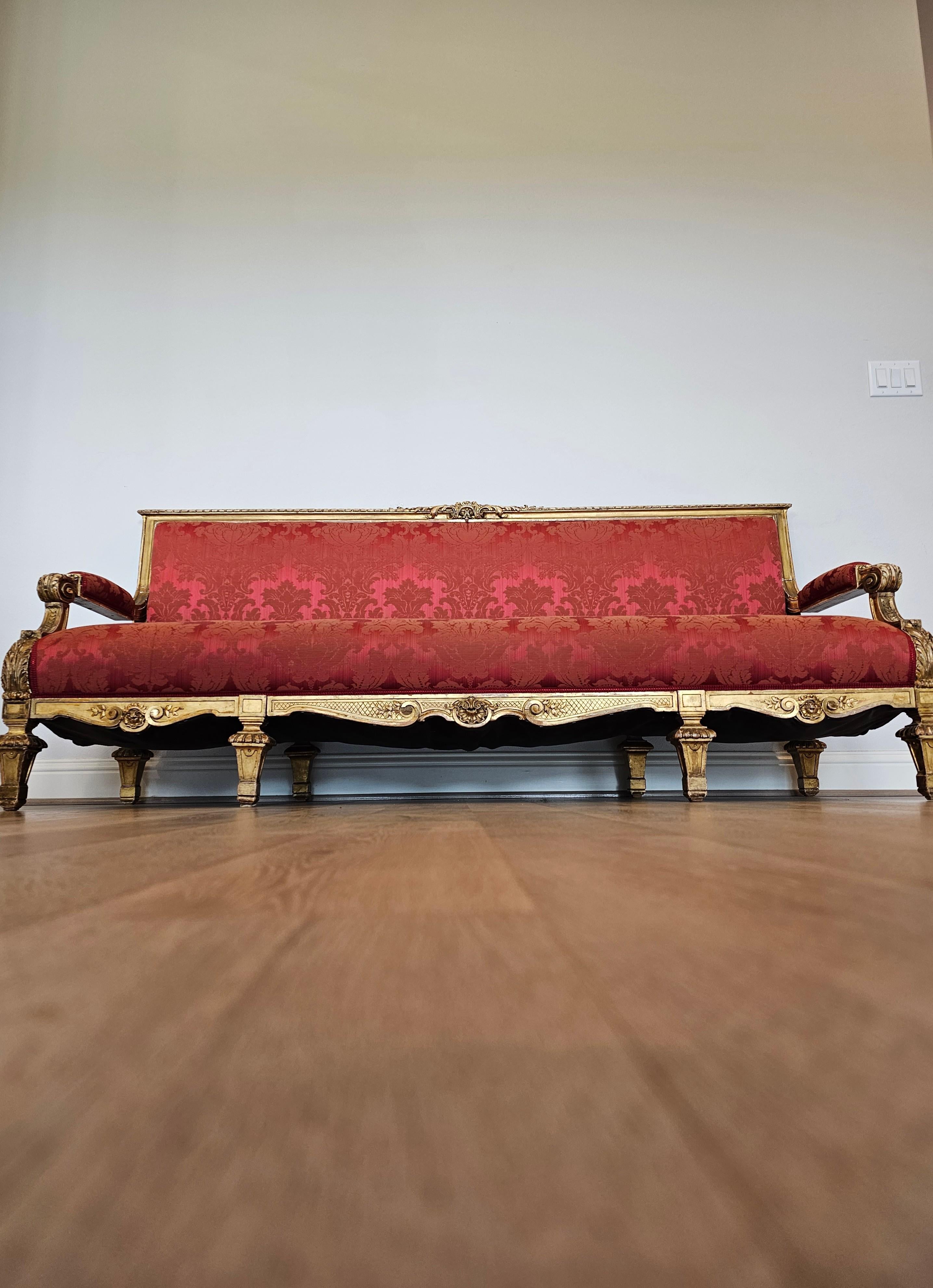 Add a touch of sophisticated elegance, timeless luxury and romantic warmth with this striking Belle Époque period French gilt wood four seater long sofa. 

Exquisitely hand-crafted in France in the late 19th / early 20th century, most likely