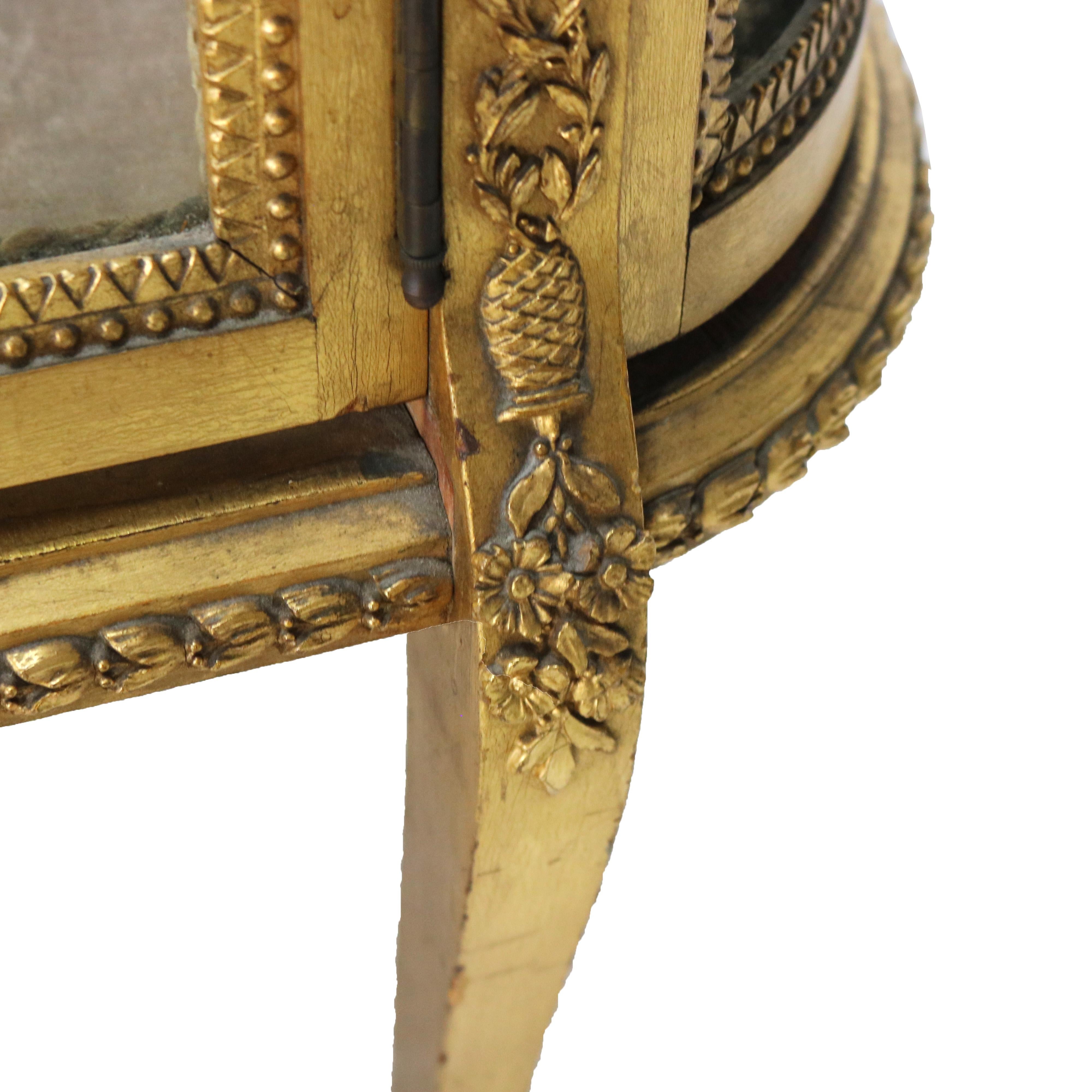 ***Reduced Delivery Rates - See Below or Click “Ask The Seller” to Request a Quote***

Antique French Louis XVI Style Giltwood & Mirrored Vitrine China Cabinet with Oak Leaf Carvings and Cabriole Legs C1900

Measures - 54.5