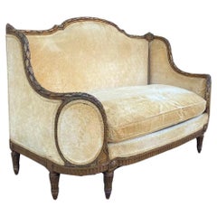 Canapé ancien de style Louis XVI en bois doré sculpté Canape Cameo