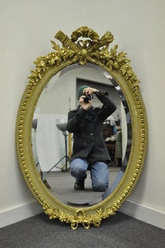 Antique French Louis XVI Style Gold Gilt Torch Flame Gesso Oval Wall Mirror