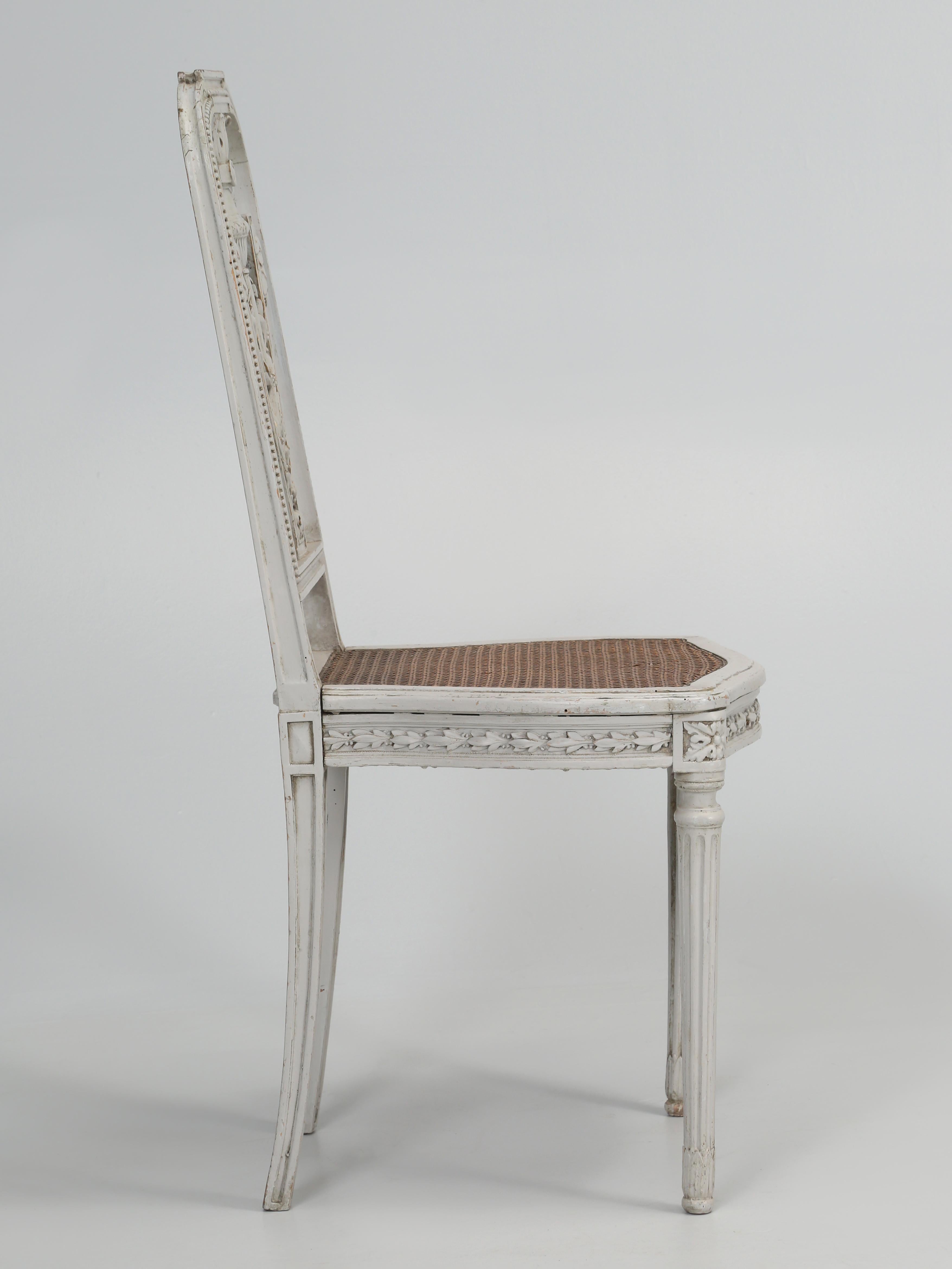 French ladies dressing table Louis XVI style chair, or simply a small occasional side chair in old paint, with the original cane seat.