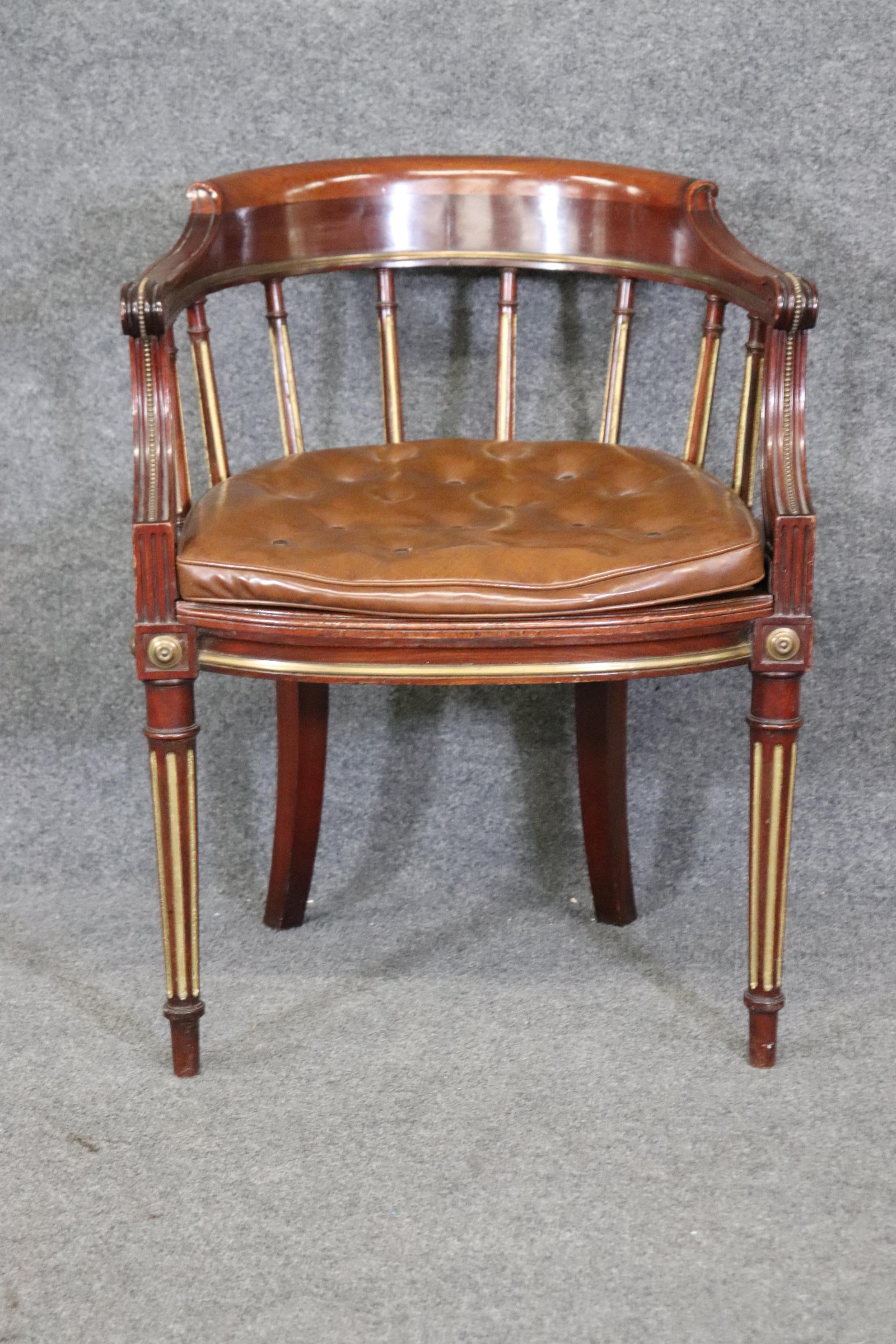 Dimensions: Height: 30 3/4 in Width: 24 in Depth: 23in Seat Height: 19 1/4 in 

This antique 19th century Louis XVI style armchair club chair is made of the highest quality! This chair is equipped with a leather tufted cushion. If you look at the