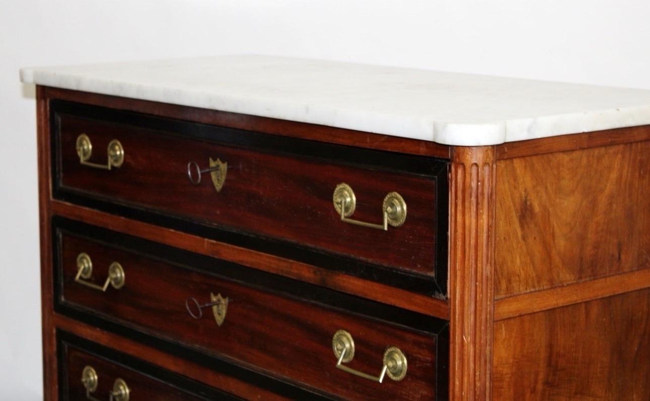 French Louis XVI 3 drawer commode with marble top. 
In mahogany with ebonized banded drawers. 
19th century
34 1/2