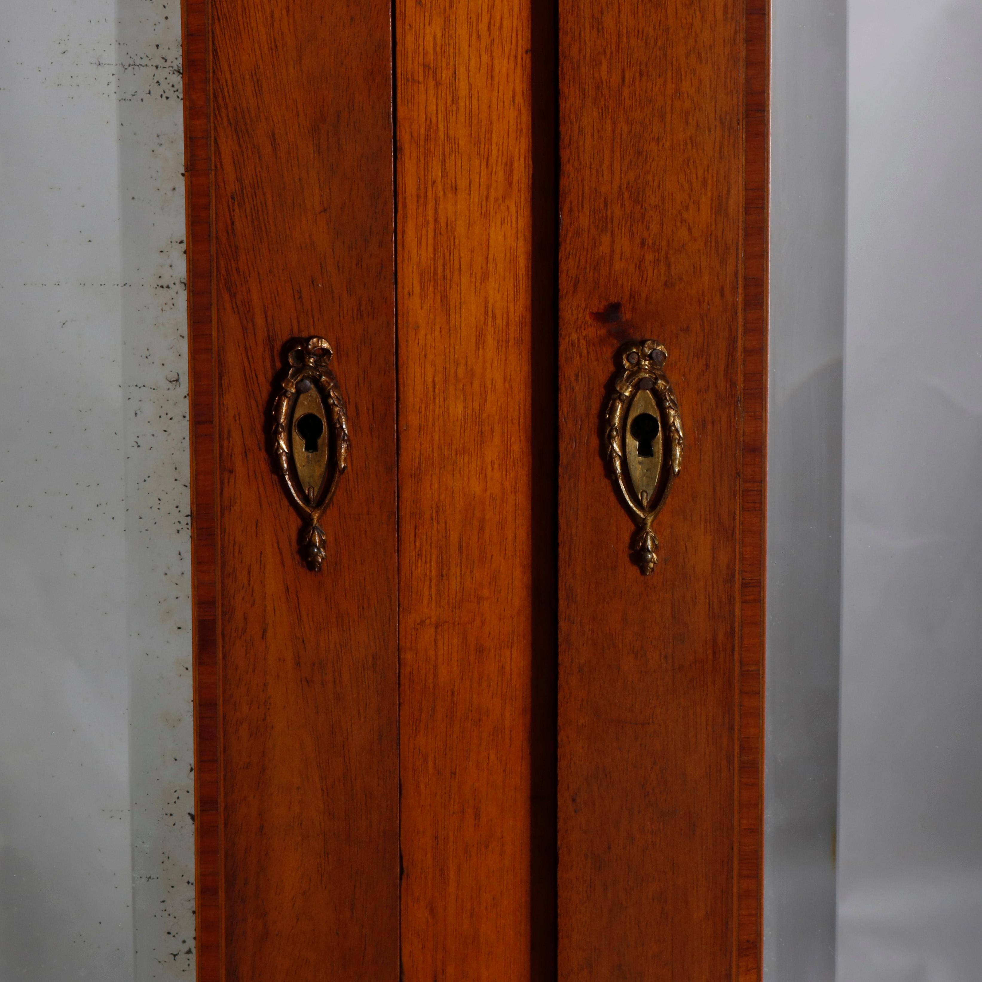 French Louis XVI Style Mahogany and Ormolu Triple Door Armoire, 19th Century 4