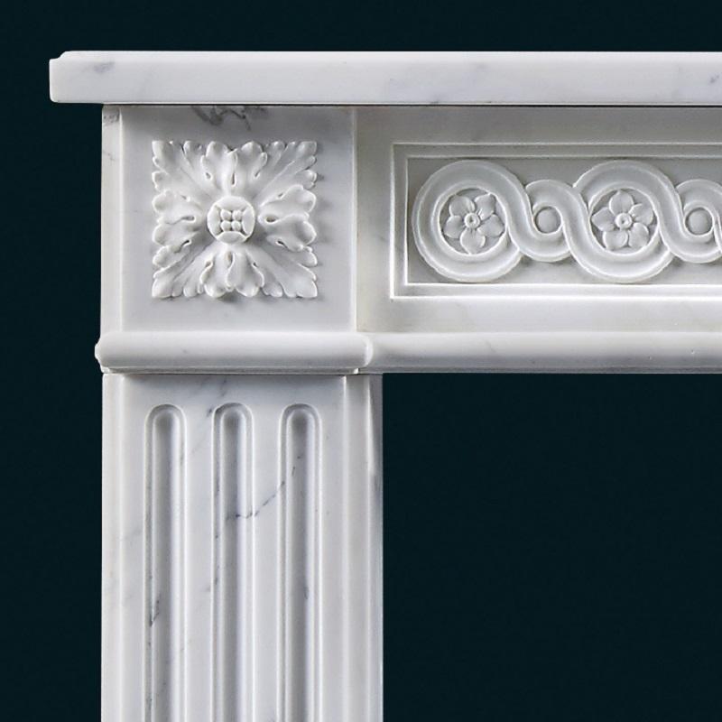 Carved Antique French Louis XVI Style Marble Fireplace with Guilloche Frieze For Sale