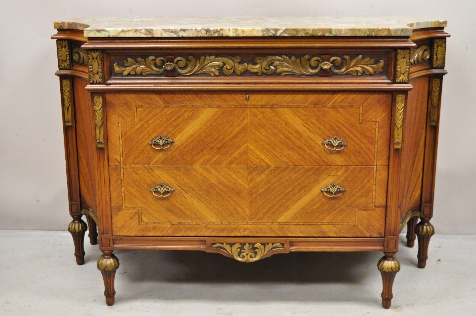 Antique French Louis XVI Style Marble Top Satinwood Demilune Dresser Commode. Item  features a shaped rouge marble top, 6 legs, curved sides, satinwood mahogany case with sunburst inlay, 3 dovetailed drawers, working lock and key, nicely carved gold