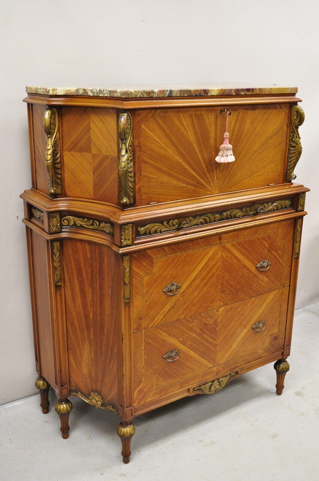 Antique French Louis XVI Style Marble Top Satinwood Tall Chest Dresser with Swans. Item features a shaped rouge marble top, carved swan accents, 6 legs, curved sides, satinwood mahogany case with sunburst inlay, 4 dovetailed drawers, working lock