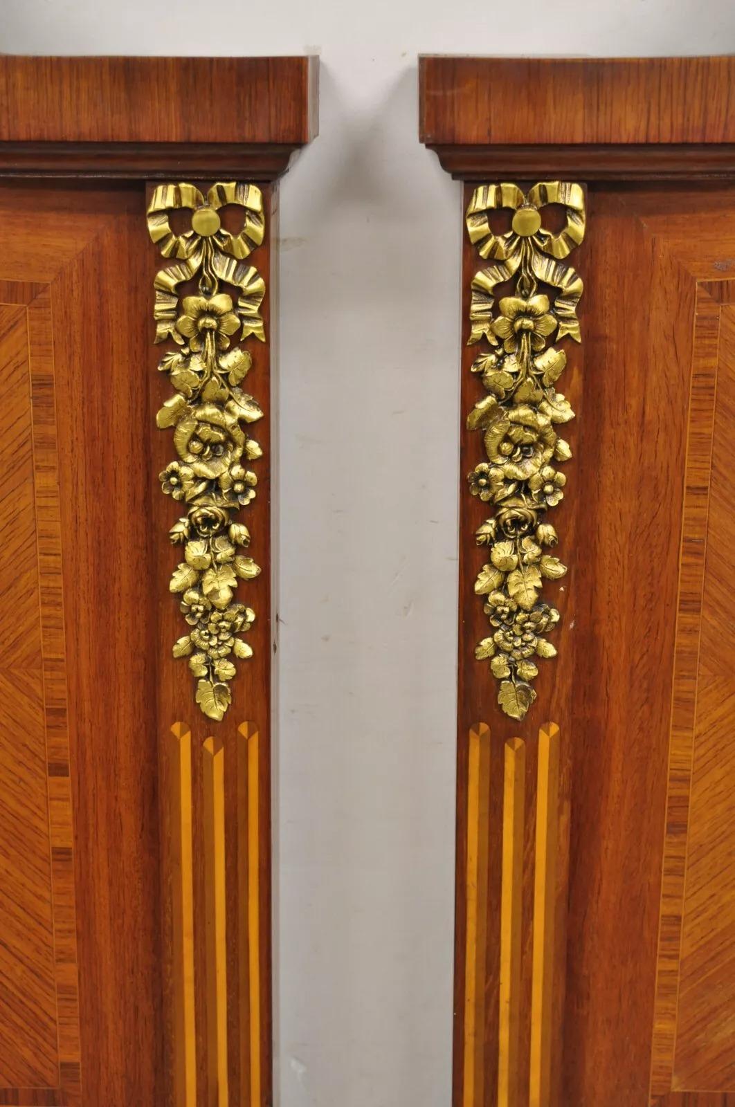 Antique French Louis XVI Style Marquetry Inlay Mahogany Twin Bed Headboards with Beautiful Bronze Ormolu - a Pair. Item features ornate satinwood inlay, cast bronze ormolu, very nice antique pair of headboards. Circa Early 20th Century.