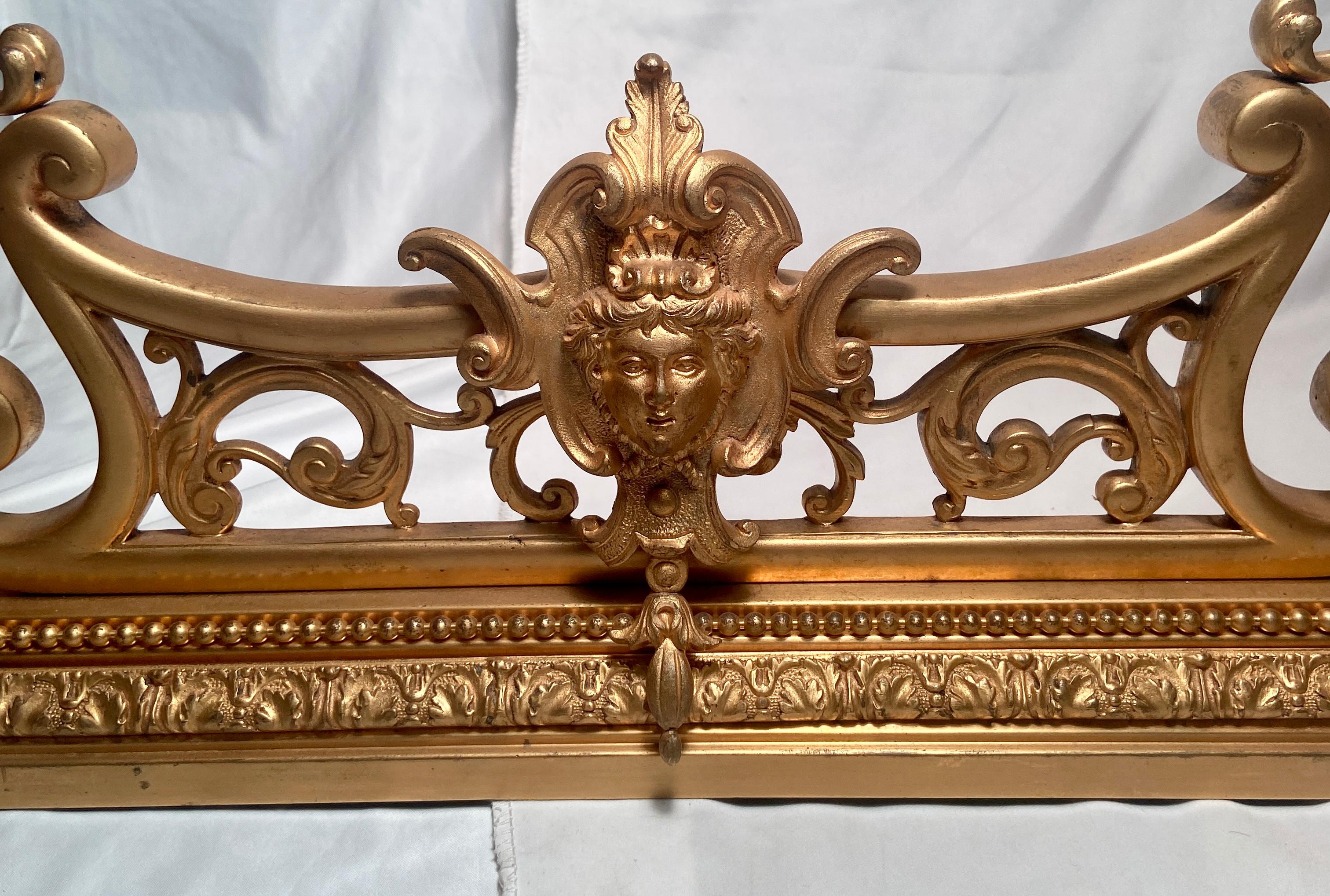 Exquisite antique French Louis XVI style Ormolu fireplace fender. Beautiful ormolu with intricate detail work.
