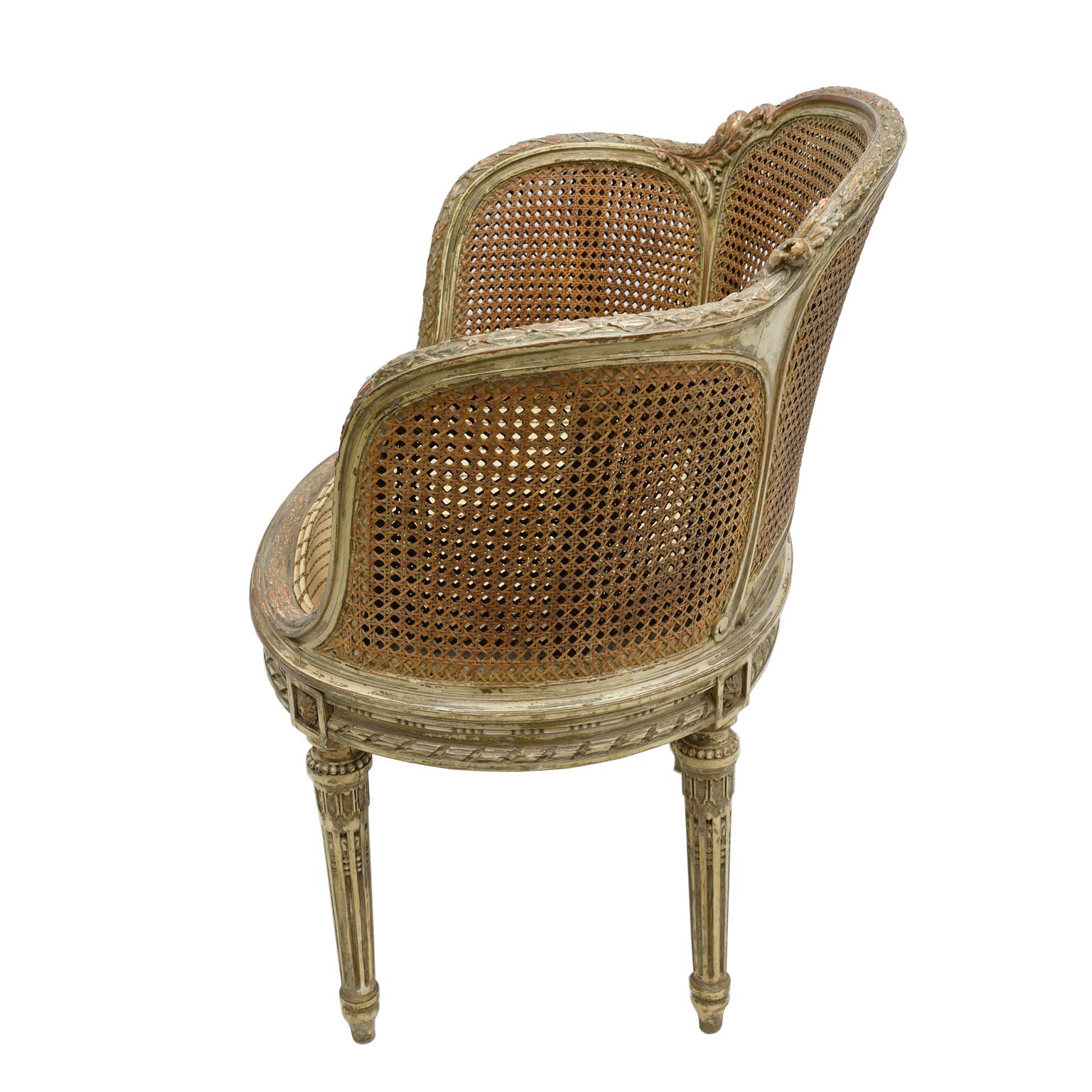 Carved Antique French Louis XVI Style Polychrome and Gilt Barrel Desk Chair with Caning