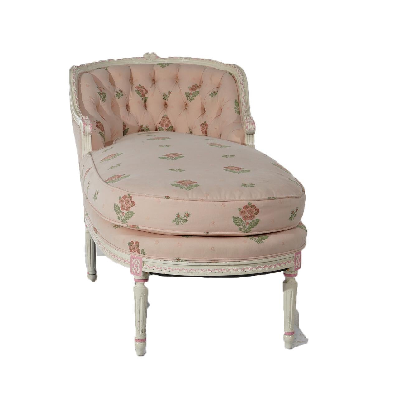 ***Ask About Reduced In-House Shipping Rates - Reliable Service & Fully Insured***
An antique upholstered  French Louis XVI style recamier offers pink and white polychromed wood frame with carved floral elements and tapered fluted legs;
