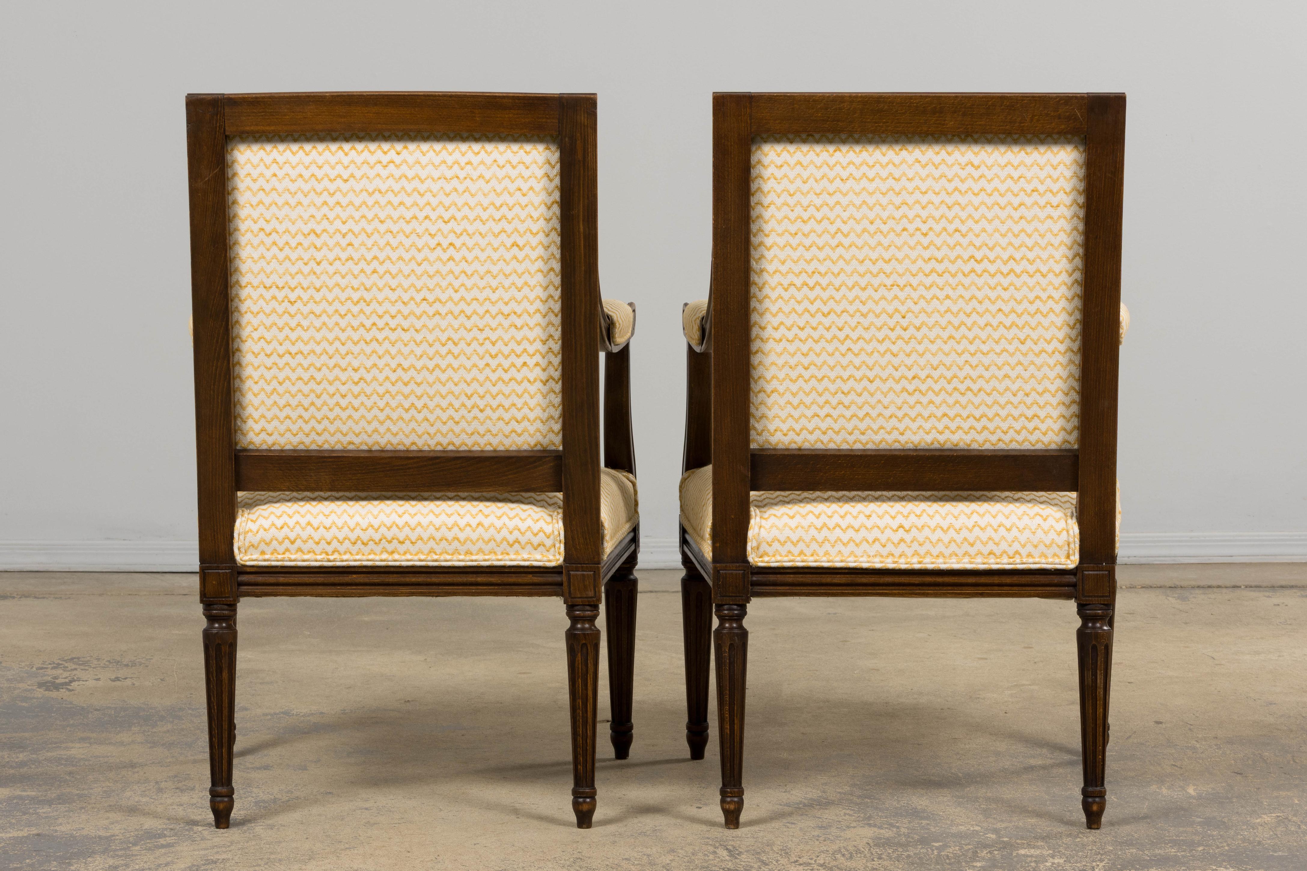 Antique French Louis XVI Style Walnut Armchairs in Yellow Linen - A Pair in vendita 12