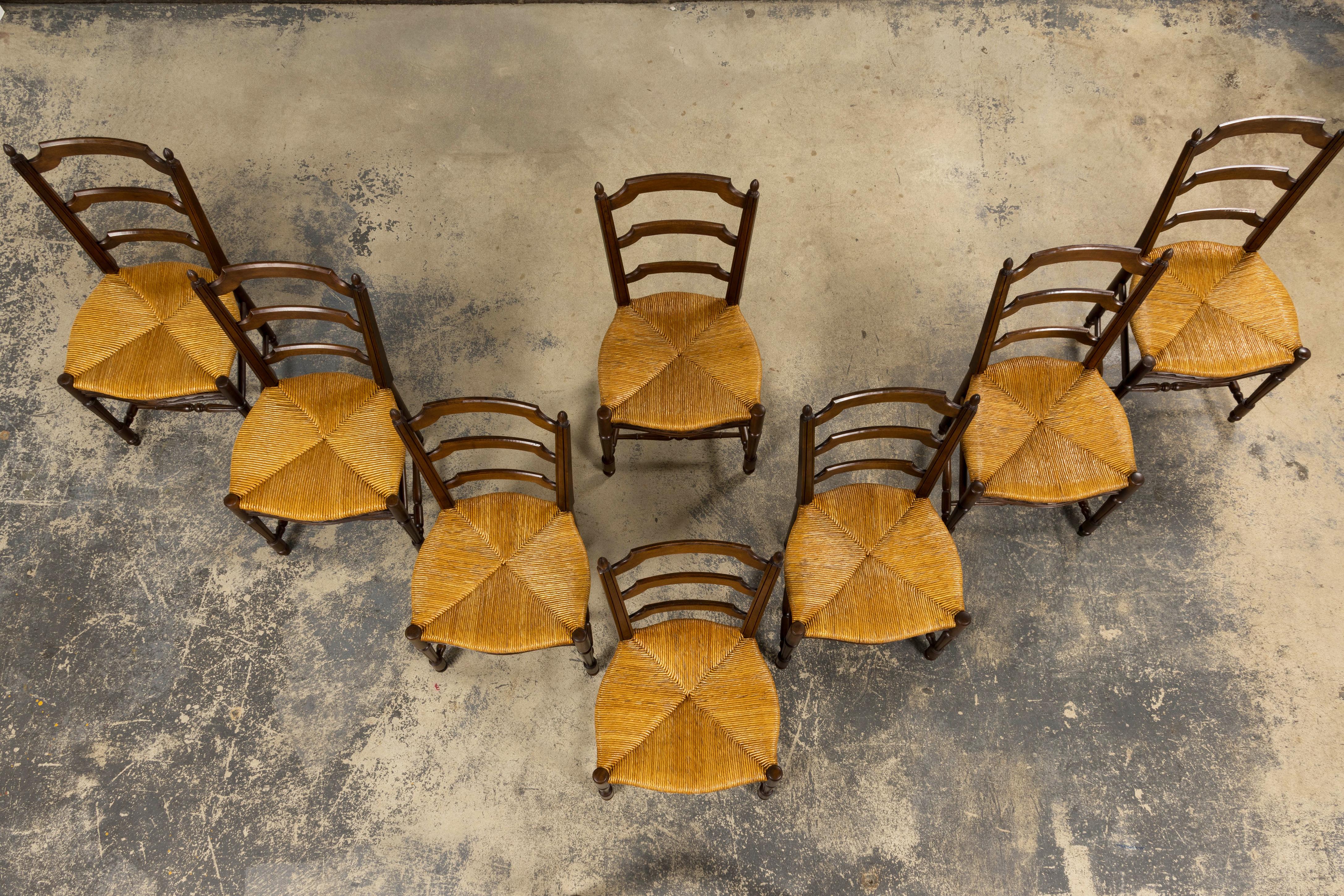 Hand-Carved Antique French Louis XVI Style Walnut Dining Chairs W/ Rush Seats - Set of 8 For Sale