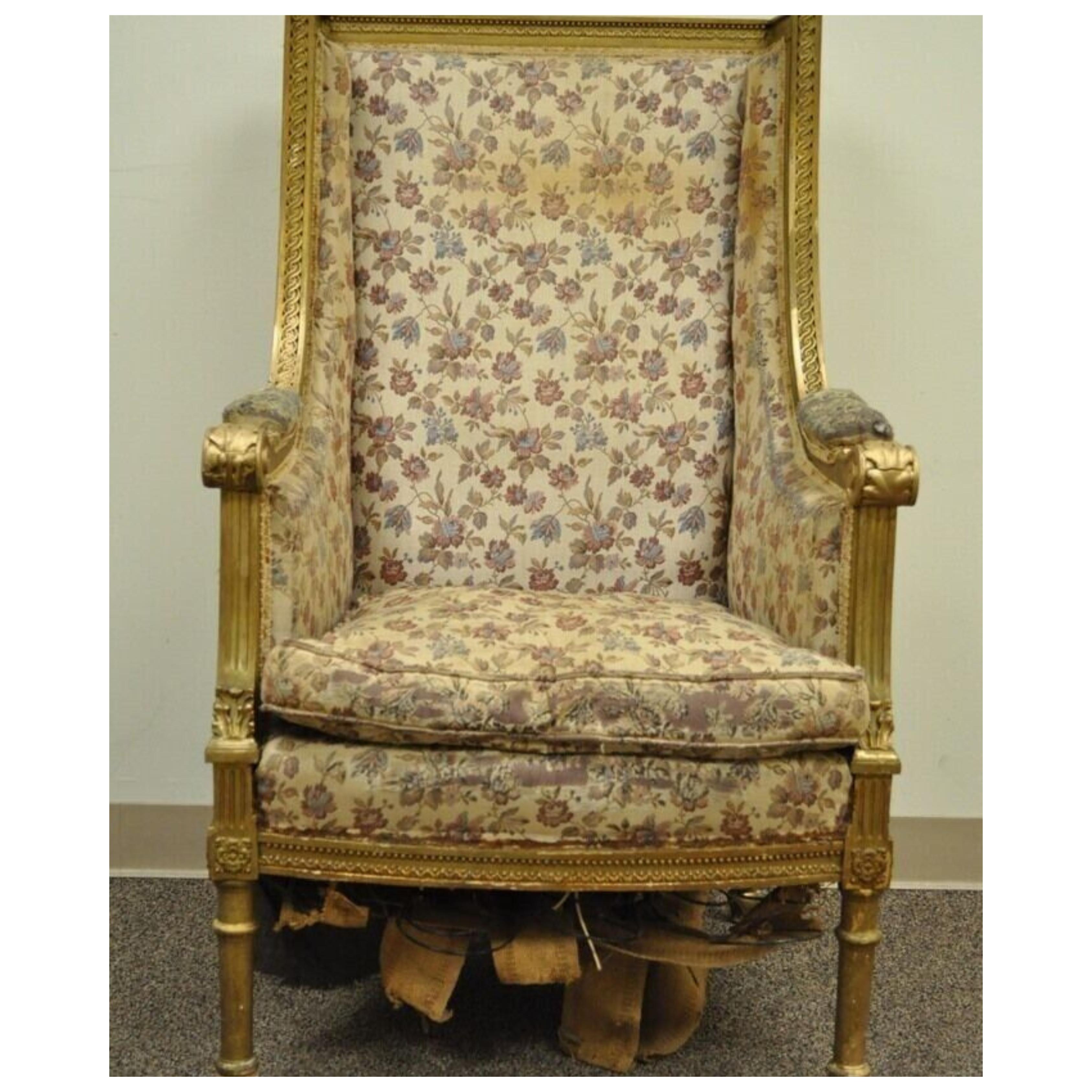Antique French Louis XVI Style Victorian Gold Gilt Wood Wing Back Bergere Arm Chair. Item featured  has a large impressive profile, carved and applied acanthus and geometric accents, original distressed gilt finish. To be refurbished/reupholstered.