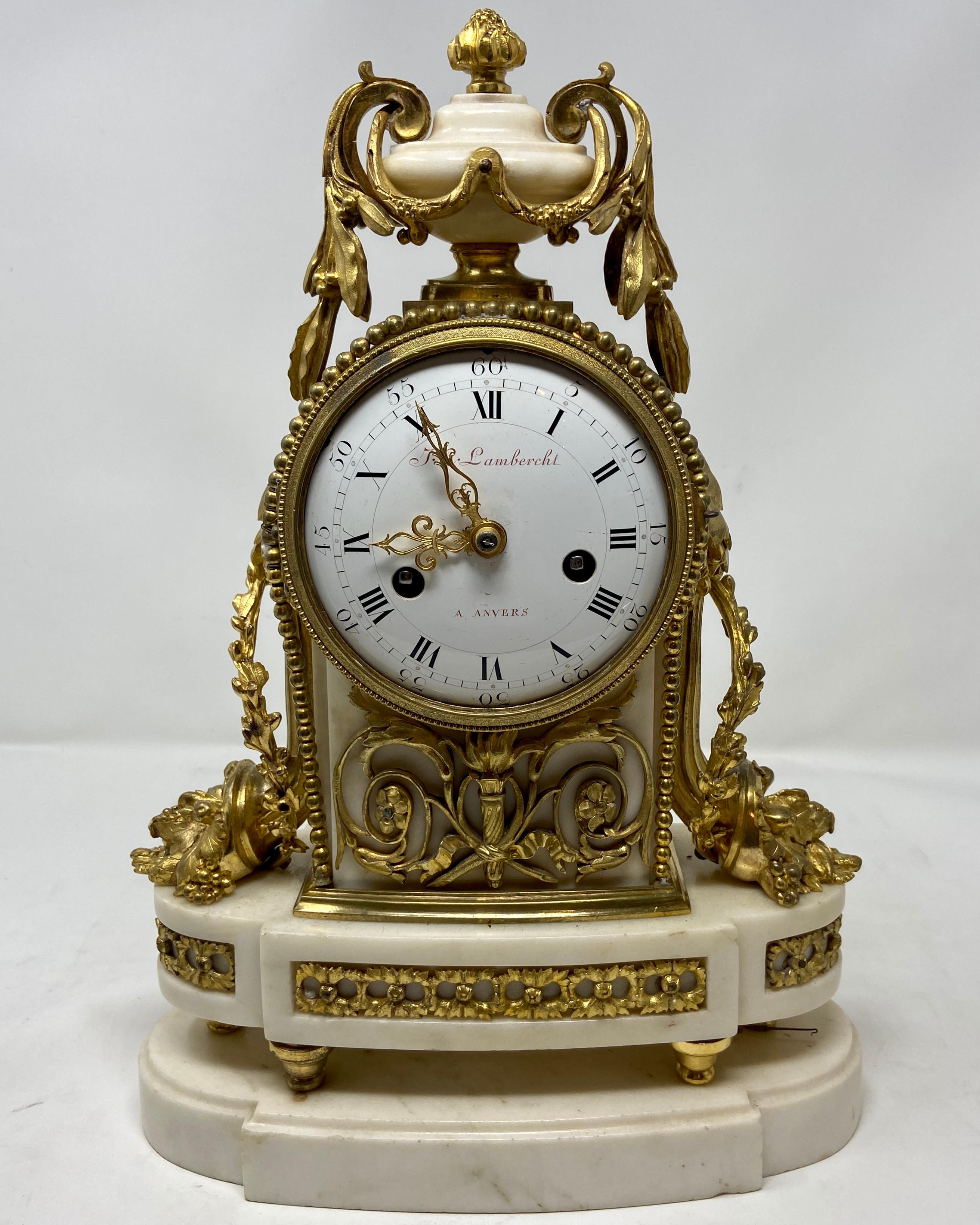 Antique French Louis XVI white marble & gold bronze 3 piece Garniture clock set.
Clock: 14